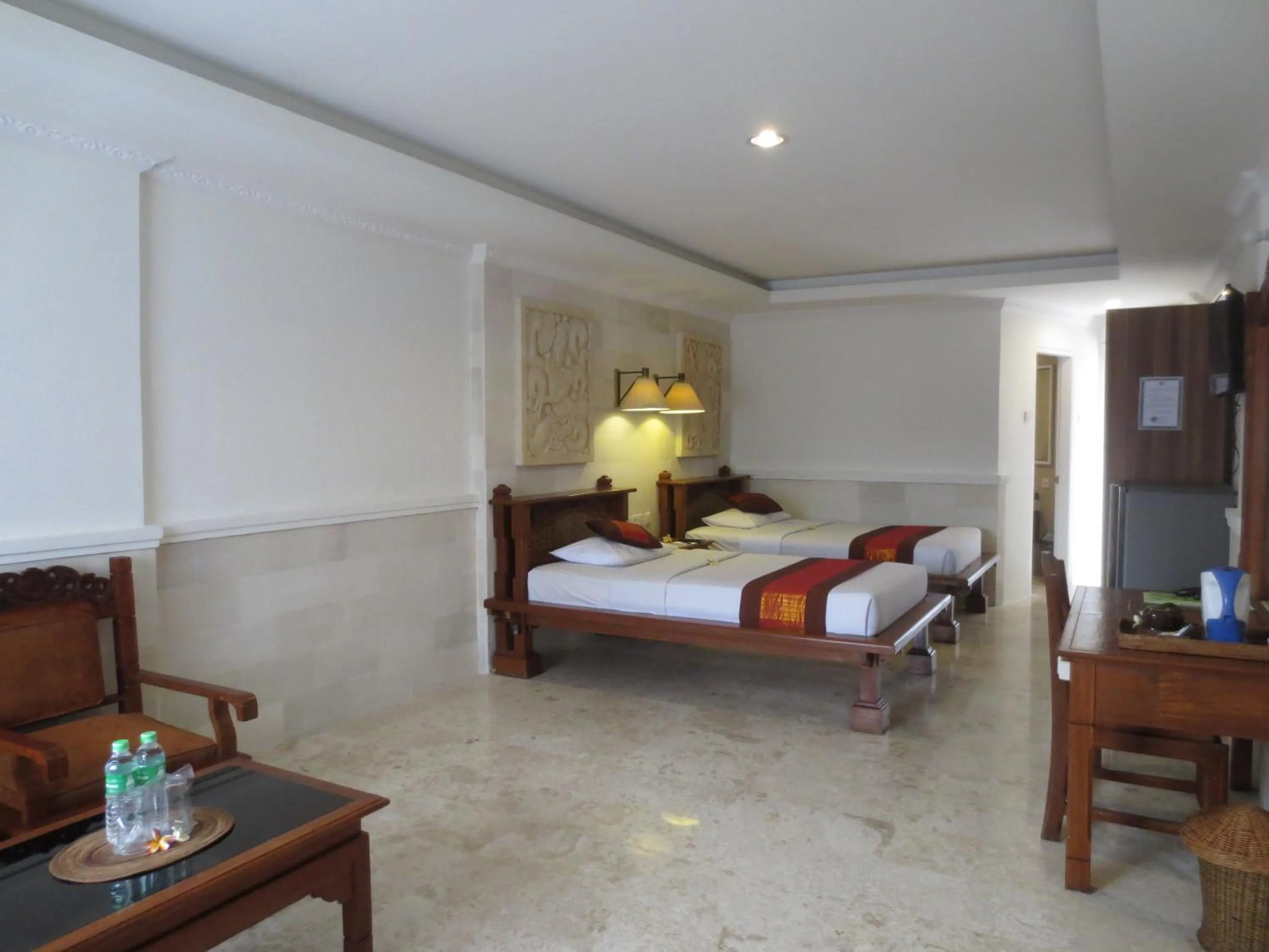 Seating area, Bed in Melasti Beach Resort & Spa Legian