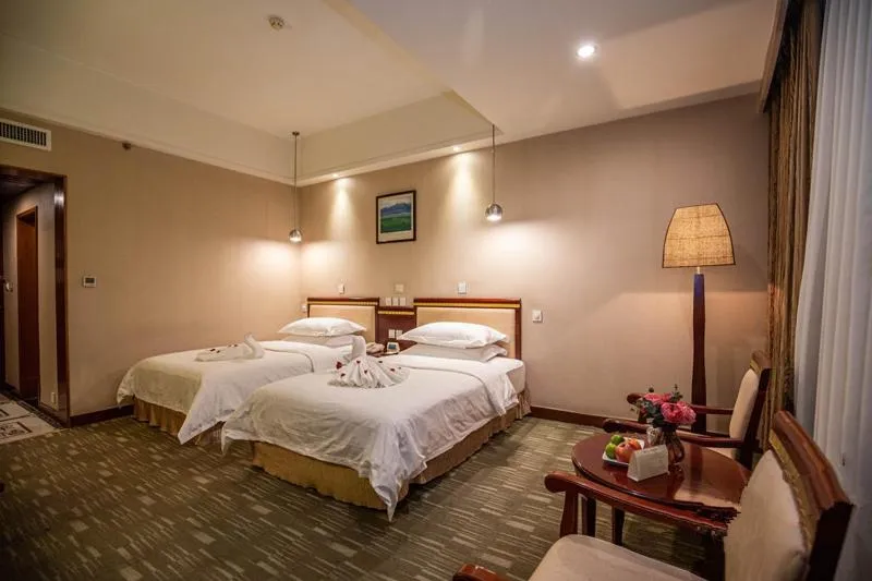 Bed in Kunming Golden Spring Hotel