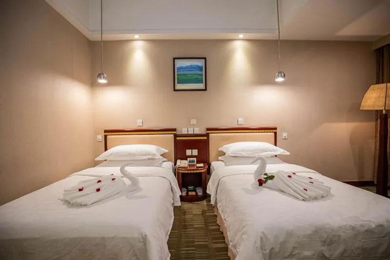 Bed in Kunming Golden Spring Hotel