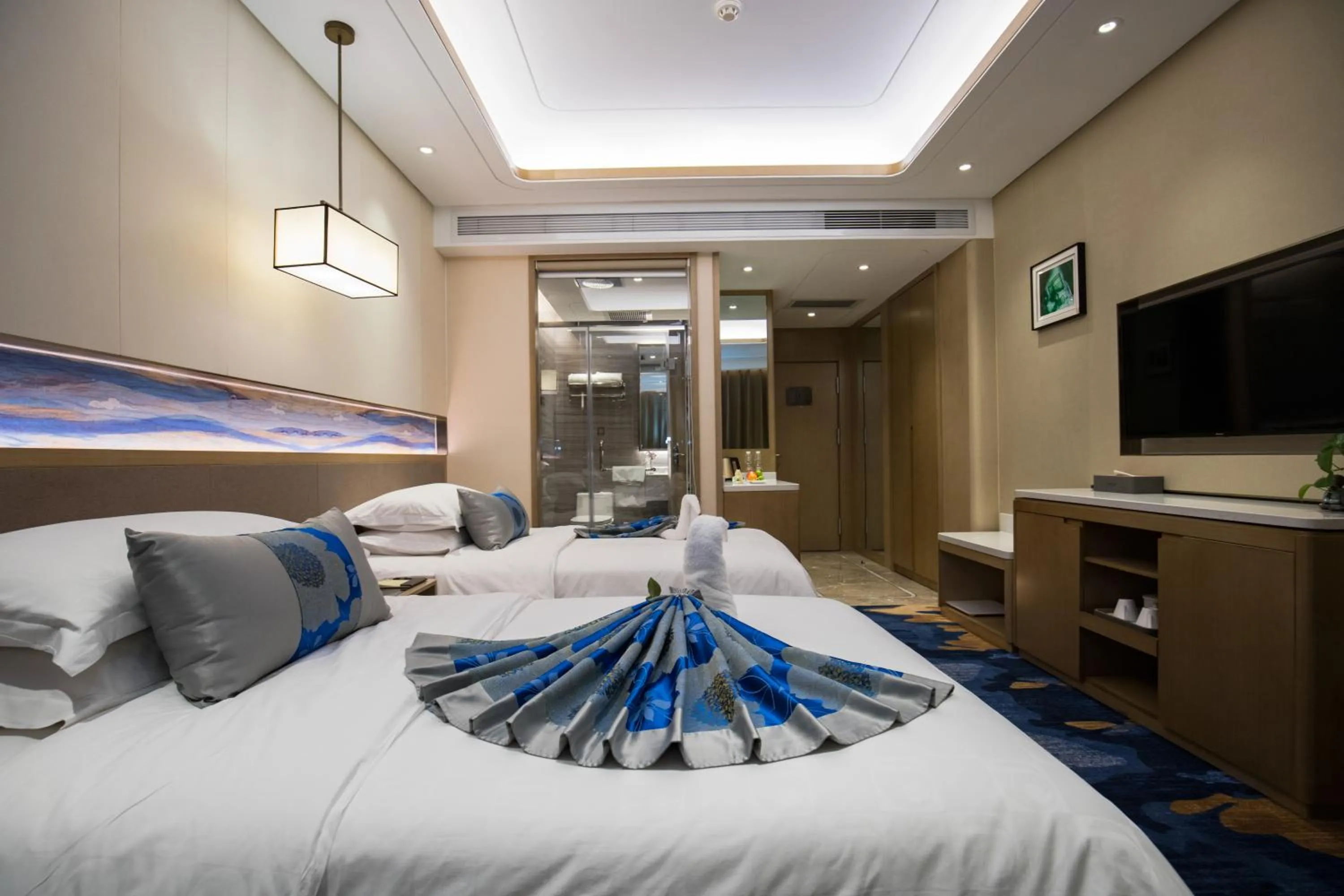 Photo of the whole room, Bed in Kunming Golden Spring Hotel