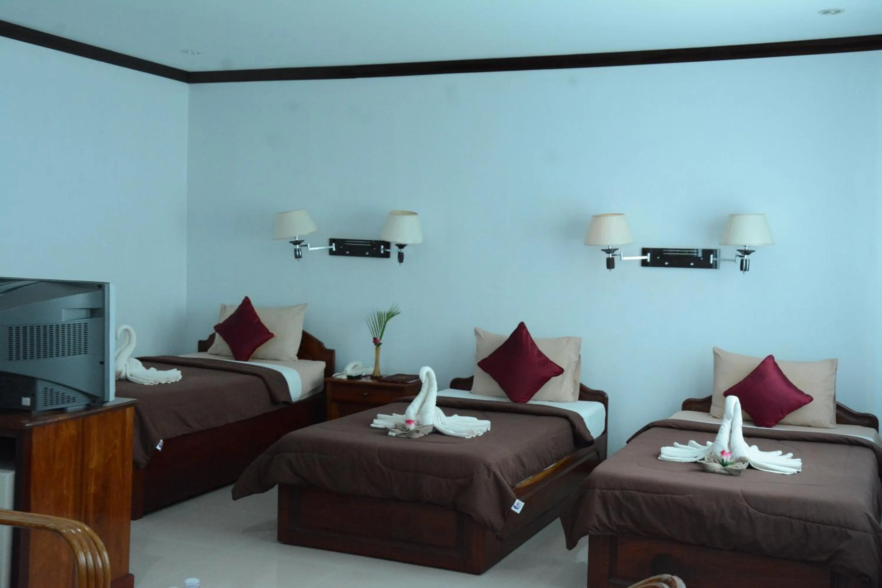 Living room, Bed in Mom's Guesthouse