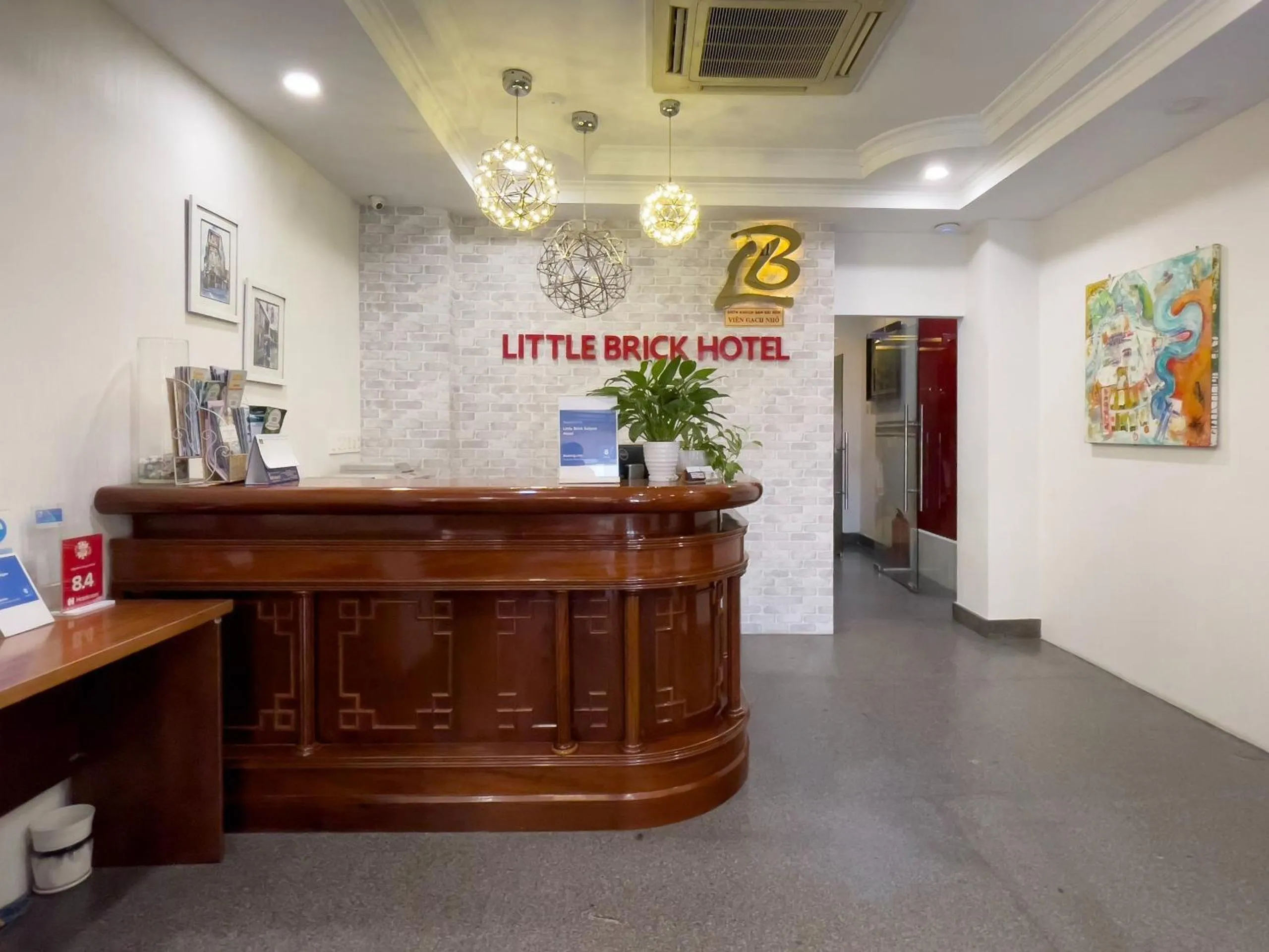Lobby or reception in Little Brick Saigon Hotel