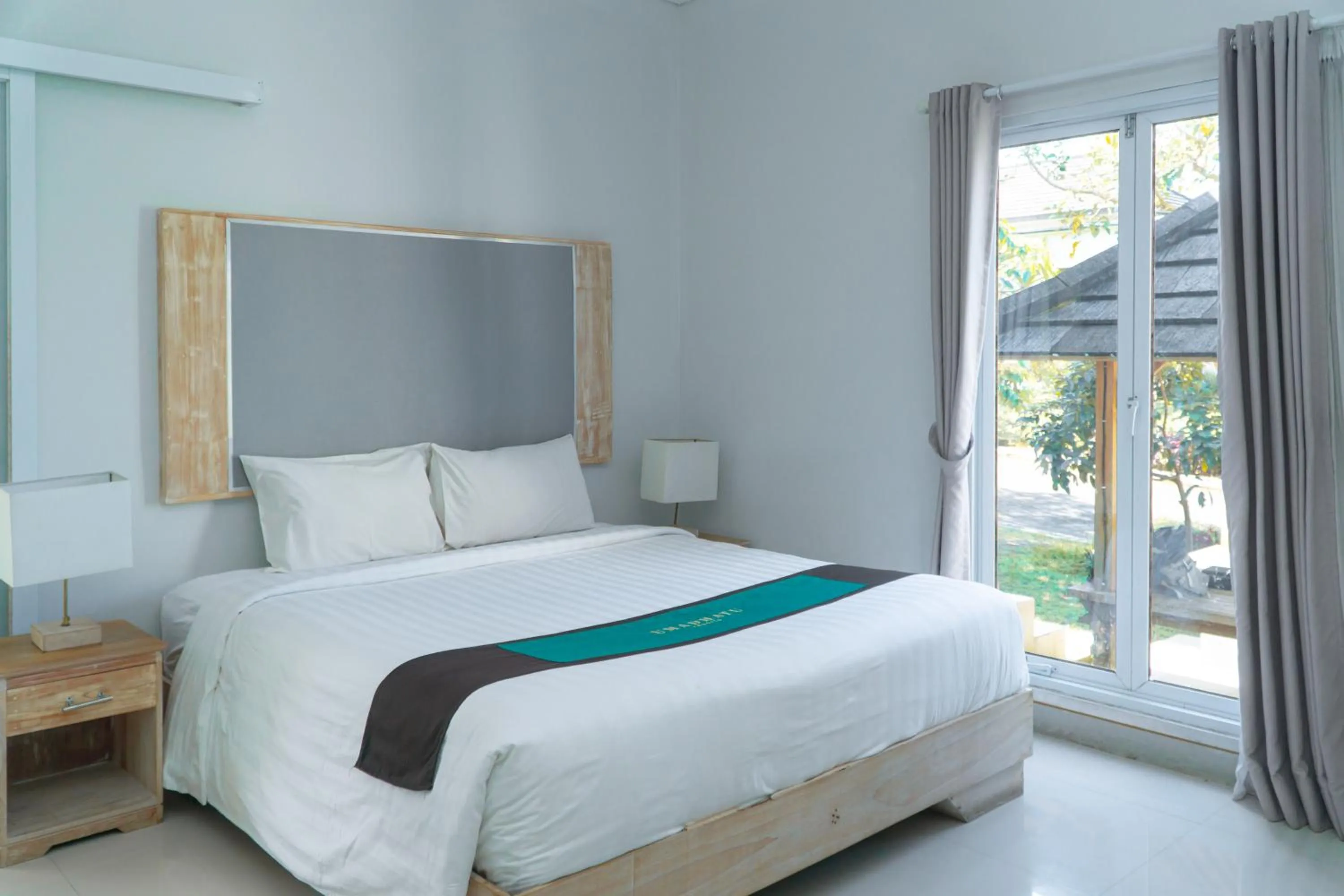 Bed in Umadhatu Resort by Amerta