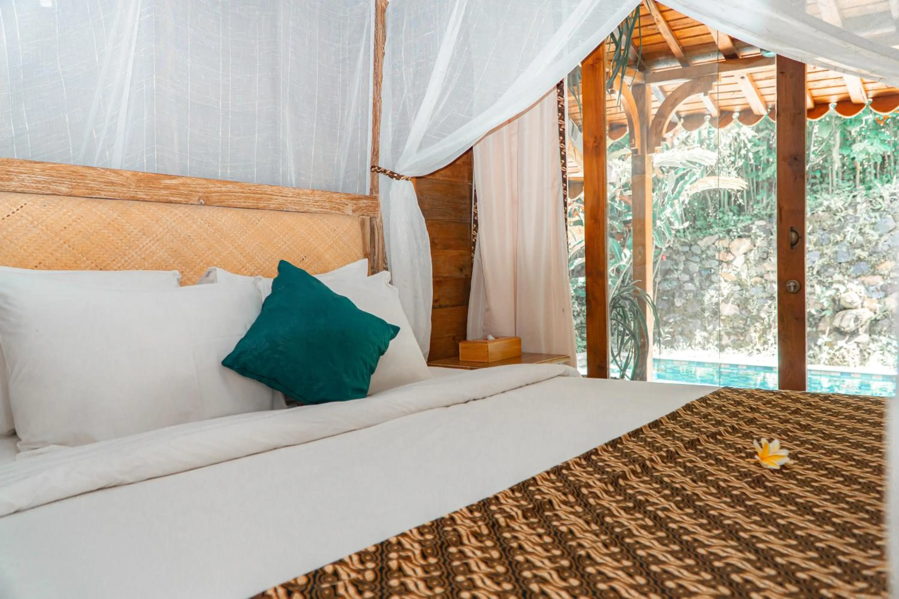 Bed in Umadhatu Resort by Amerta