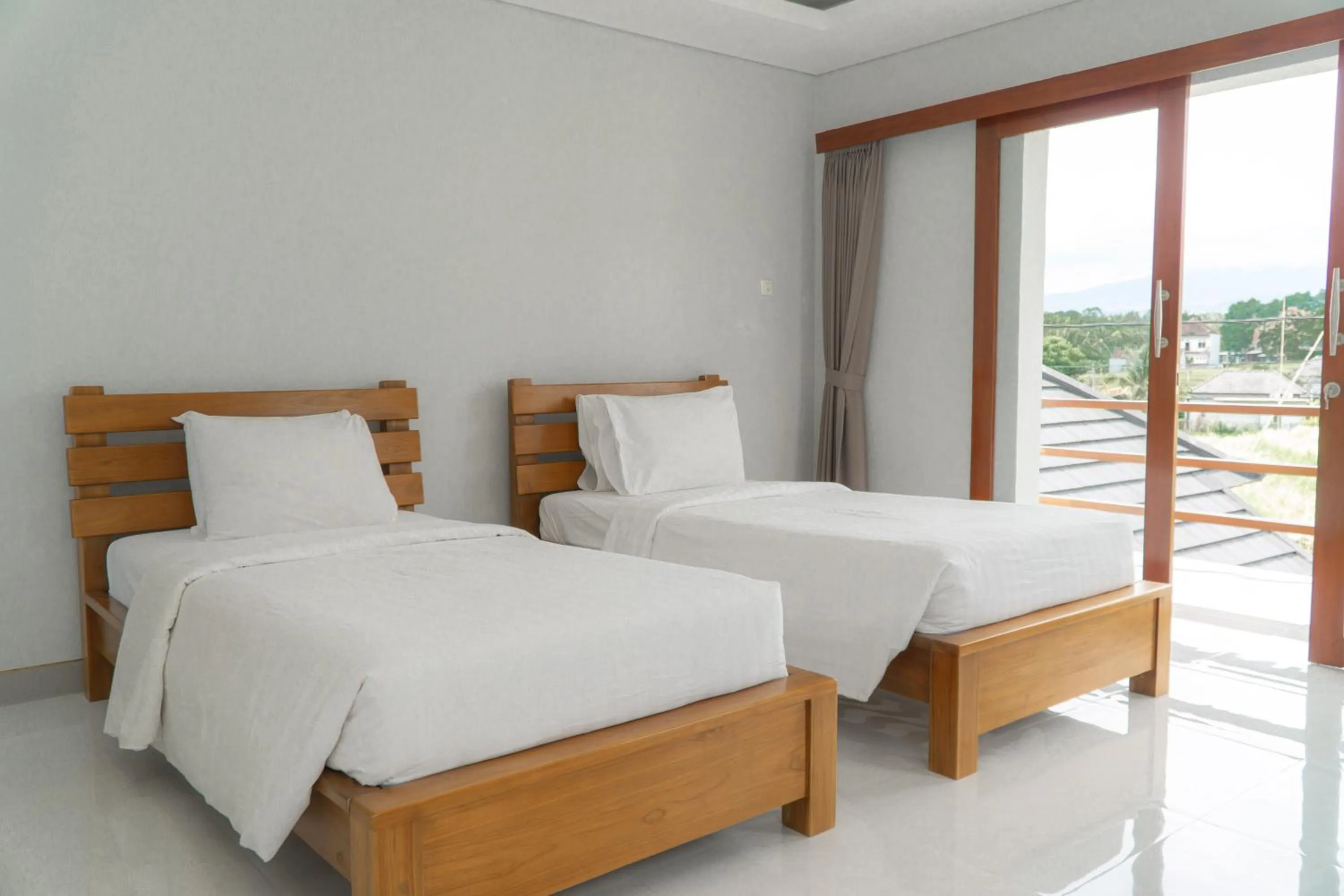 Bed in Umadhatu Resort by Amerta