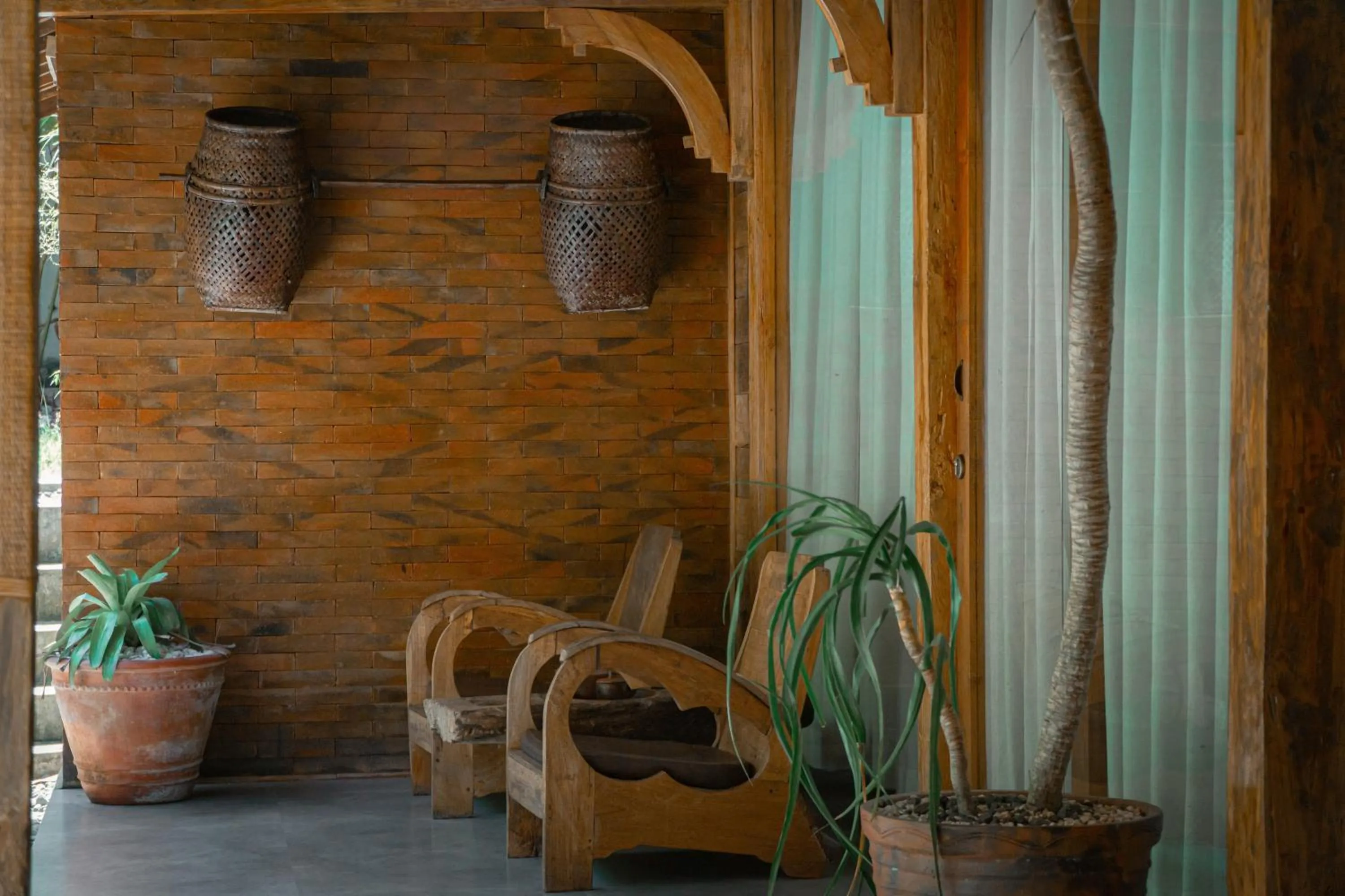 Seating area in Umadhatu Resort by Amerta