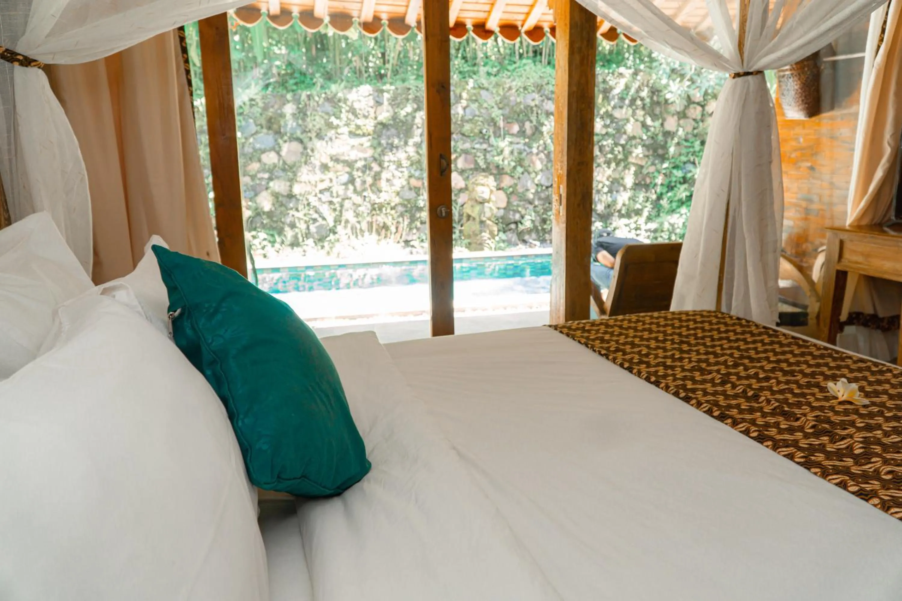 Bed in Umadhatu Resort by Amerta