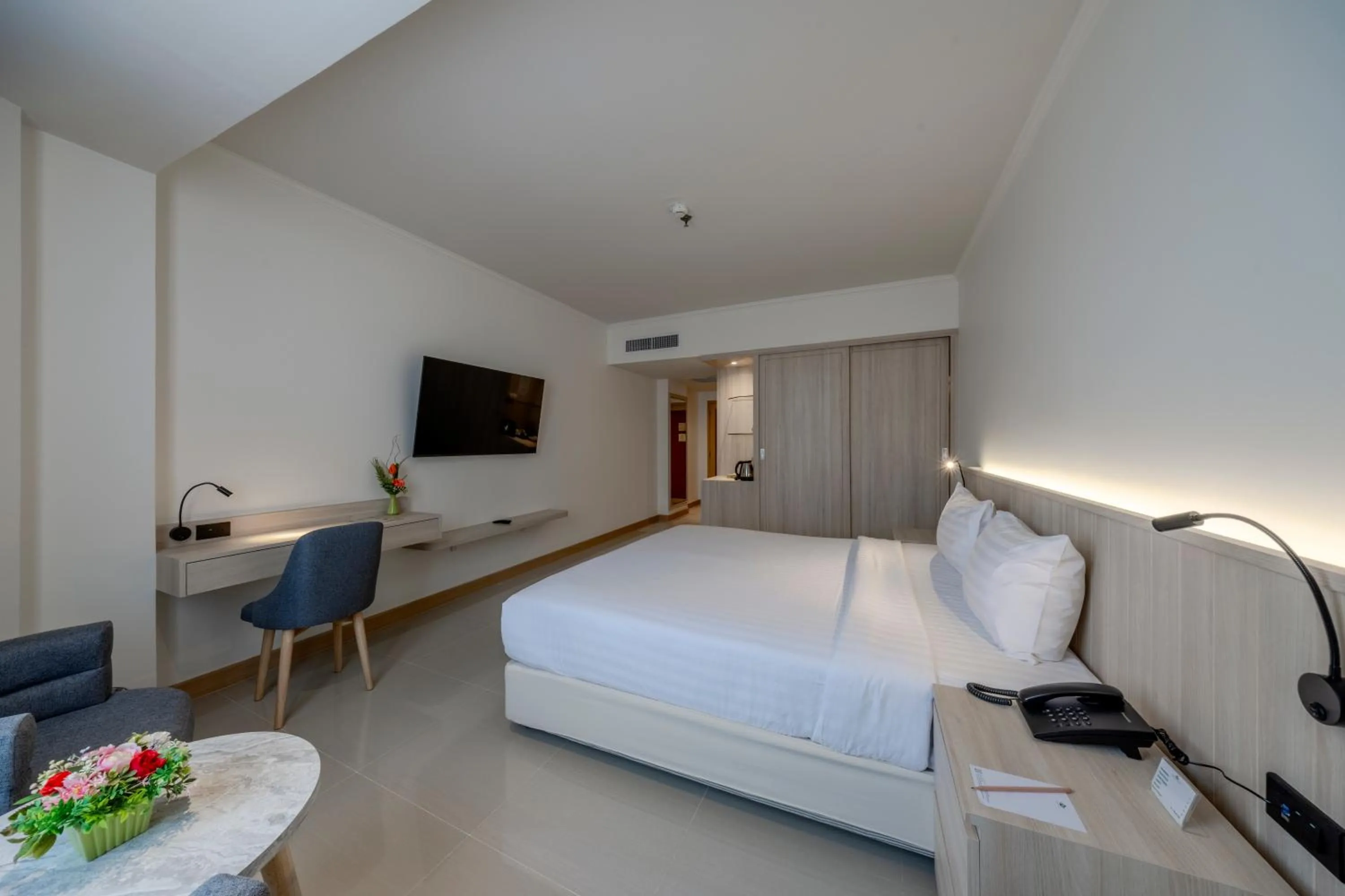 Bed in The Maruay Garden Hotel