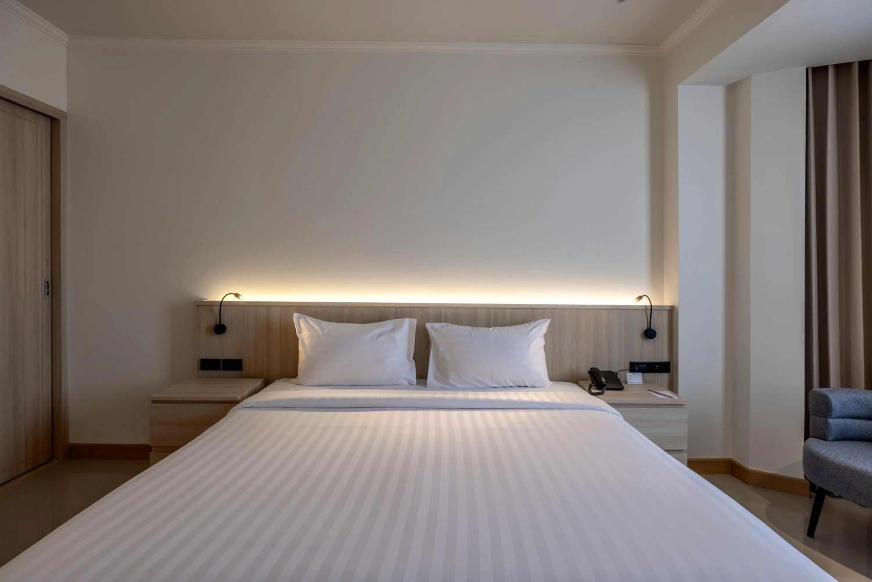 Bed in The Maruay Garden Hotel