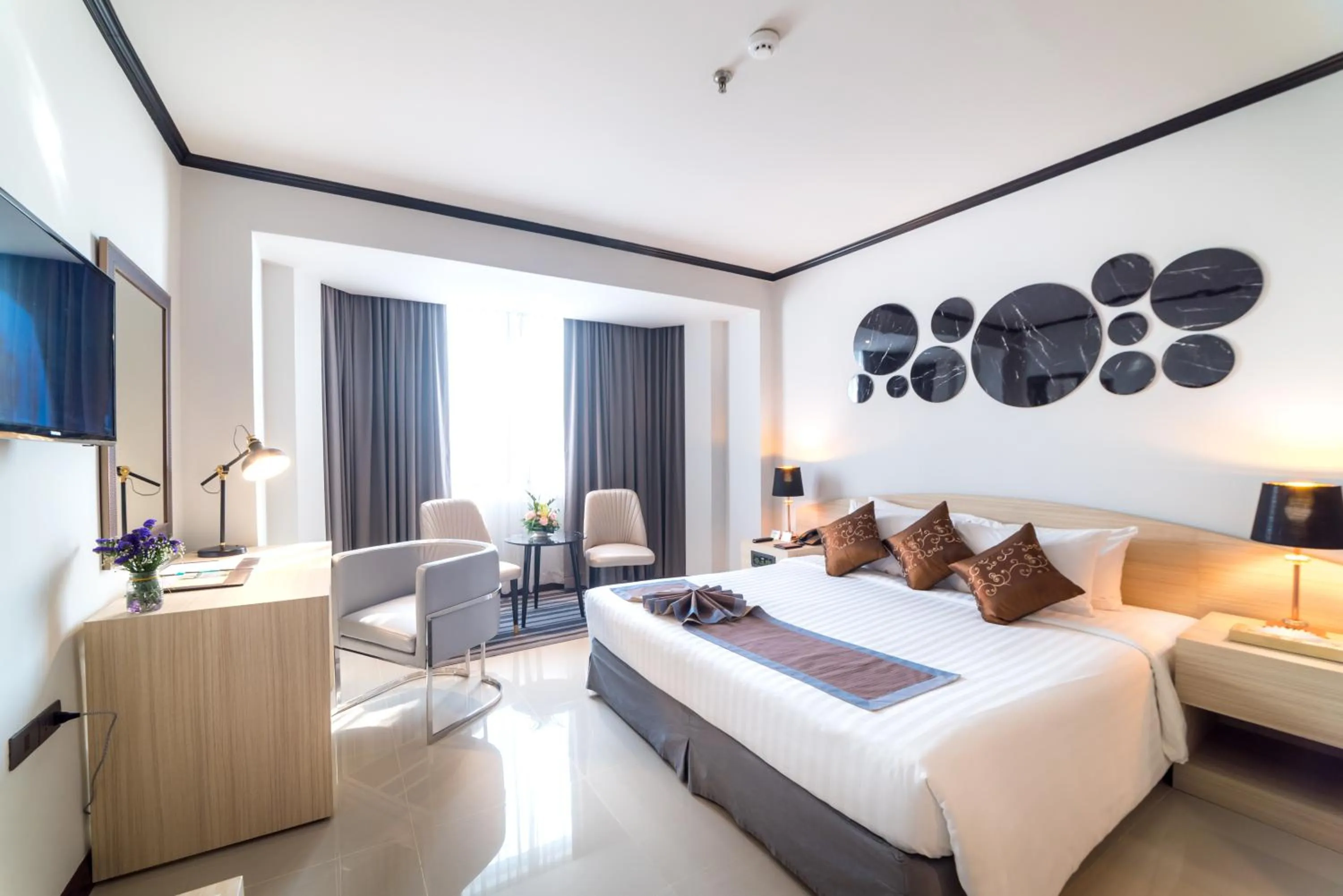 Bed in The Maruay Garden Hotel