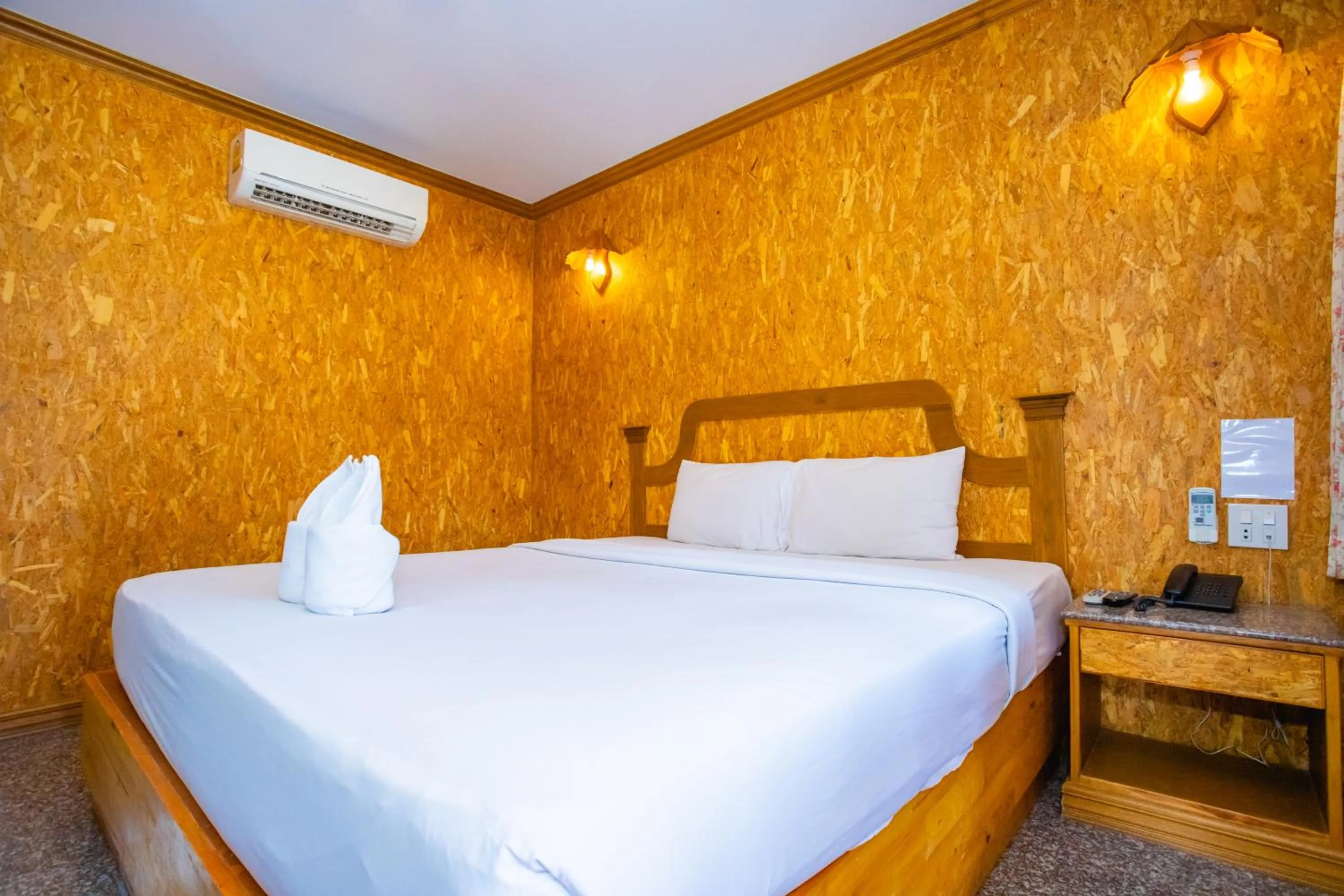 Bed in Chatsuree Boutique Resort