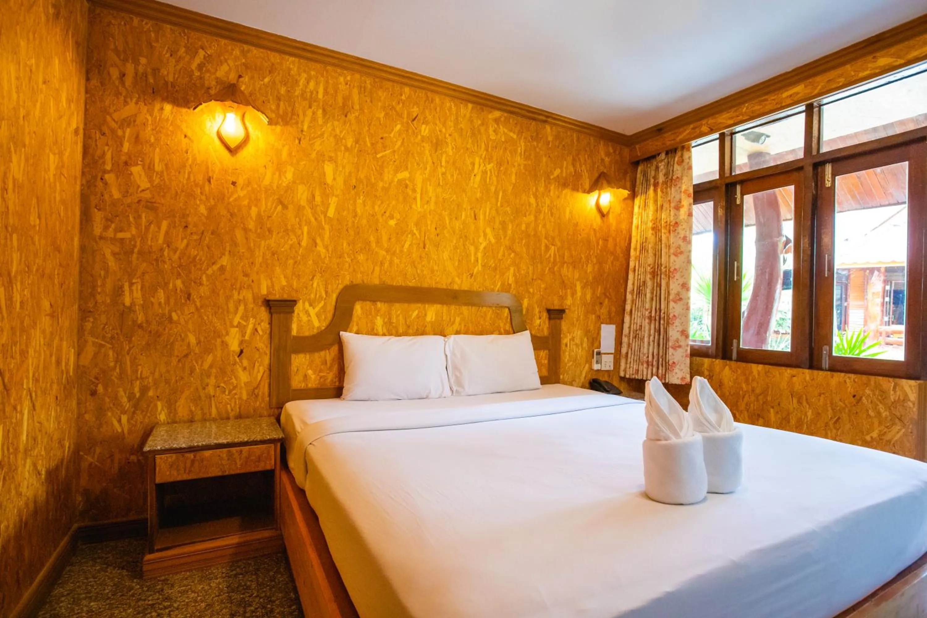 Bed in Chatsuree Boutique Resort