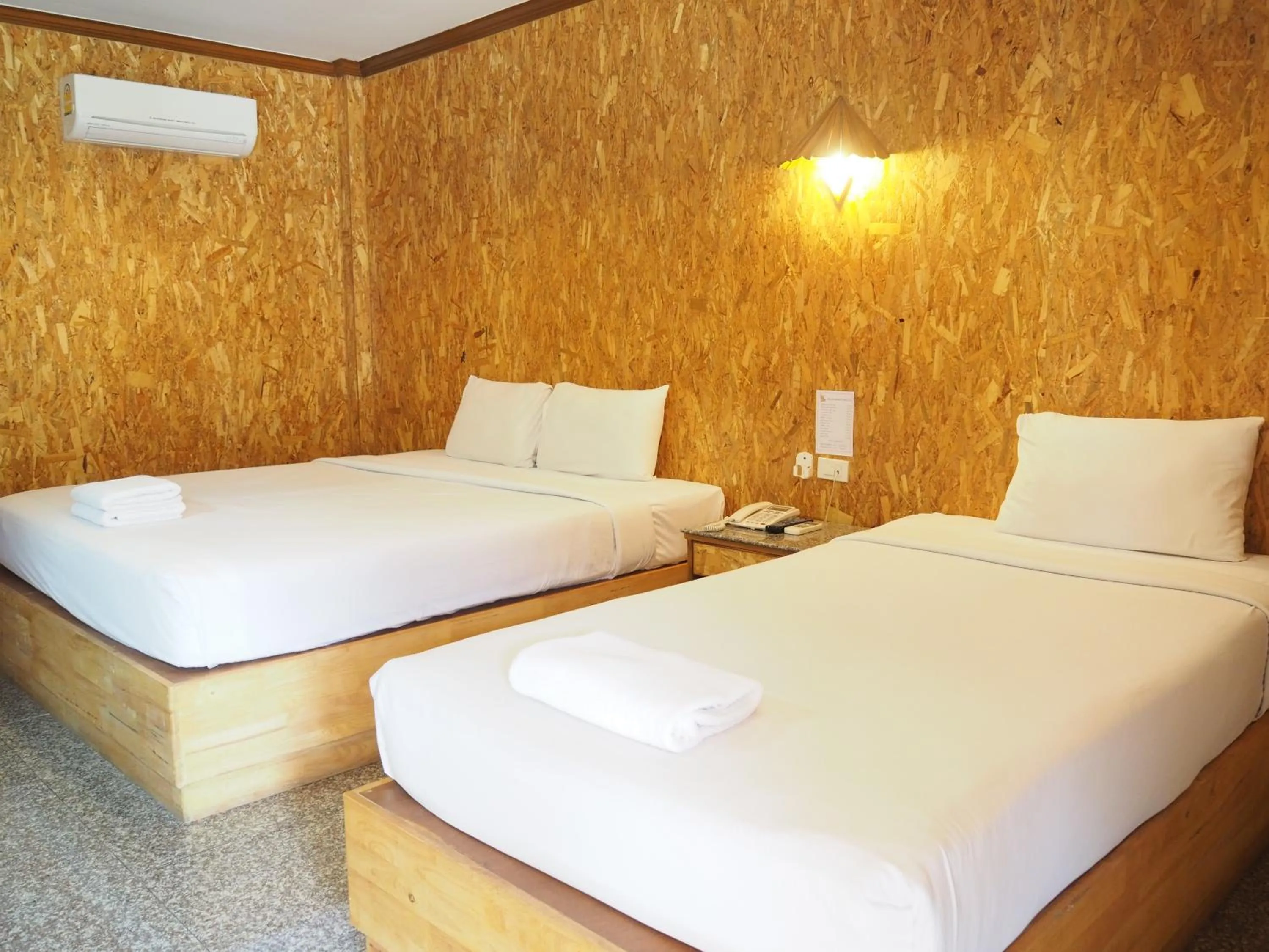 Bed in Chatsuree Boutique Resort