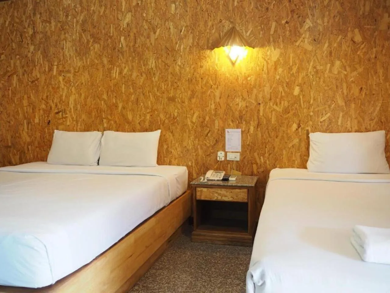 Bed in Chatsuree Boutique Resort