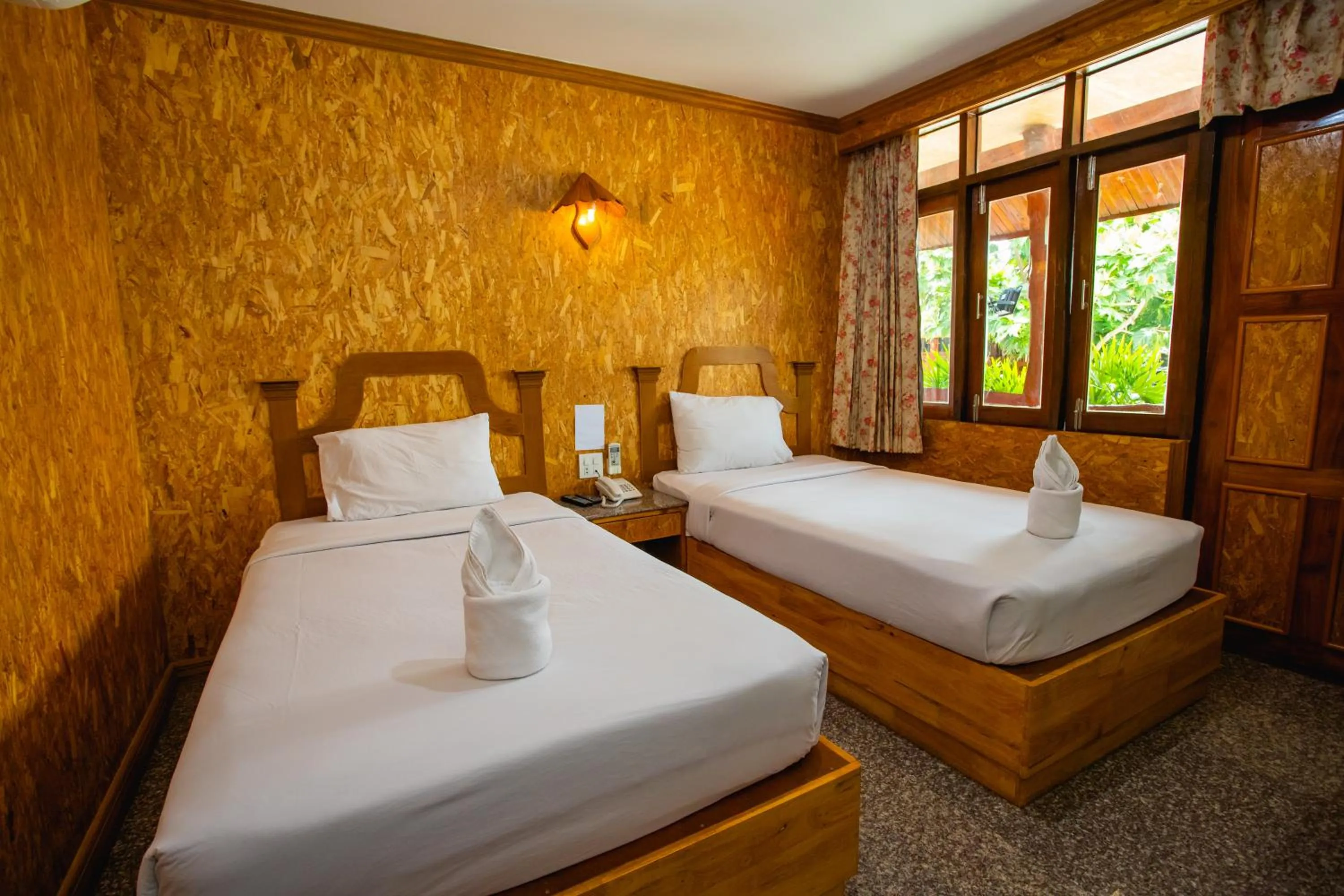Bed in Chatsuree Boutique Resort