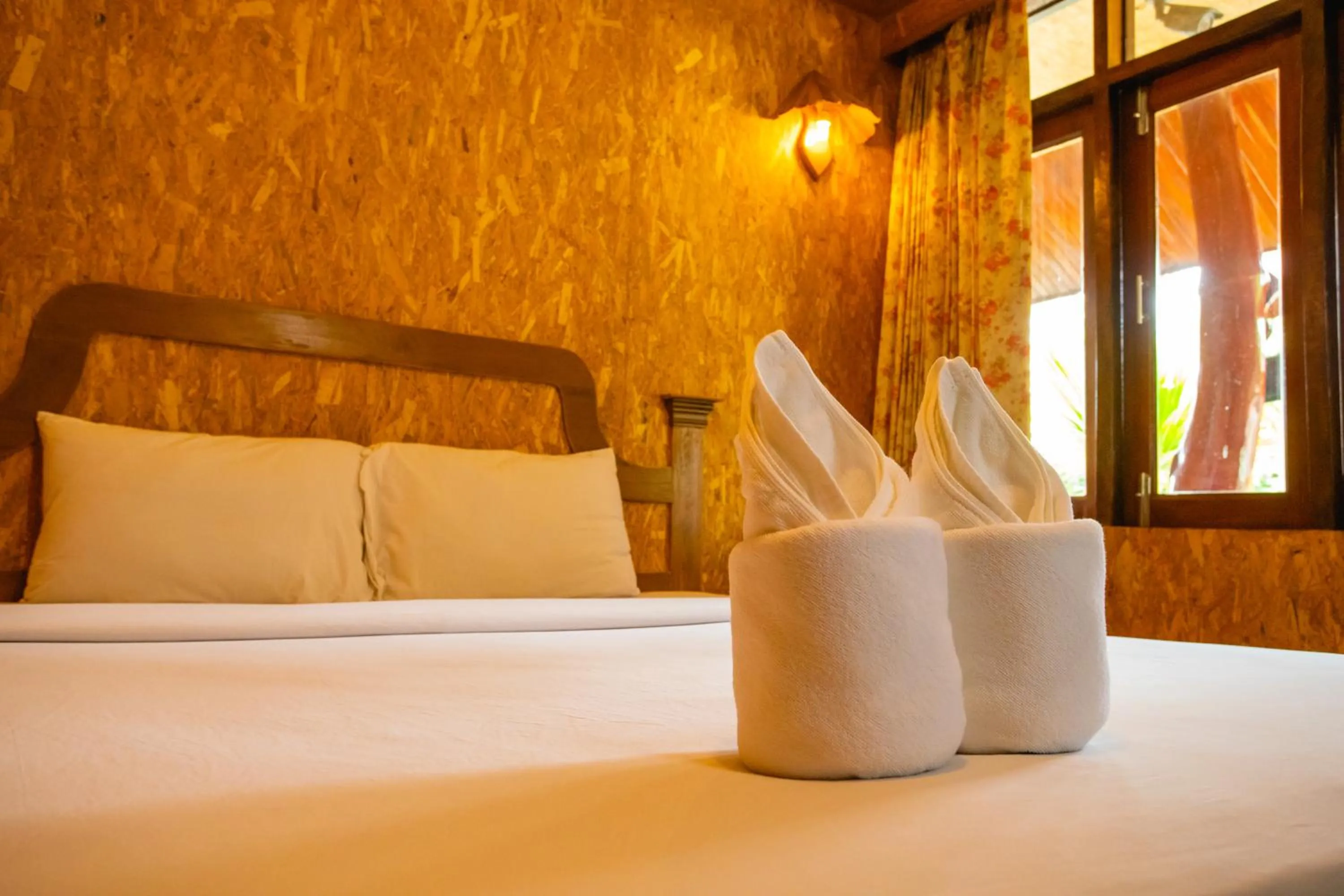 Bed in Chatsuree Boutique Resort