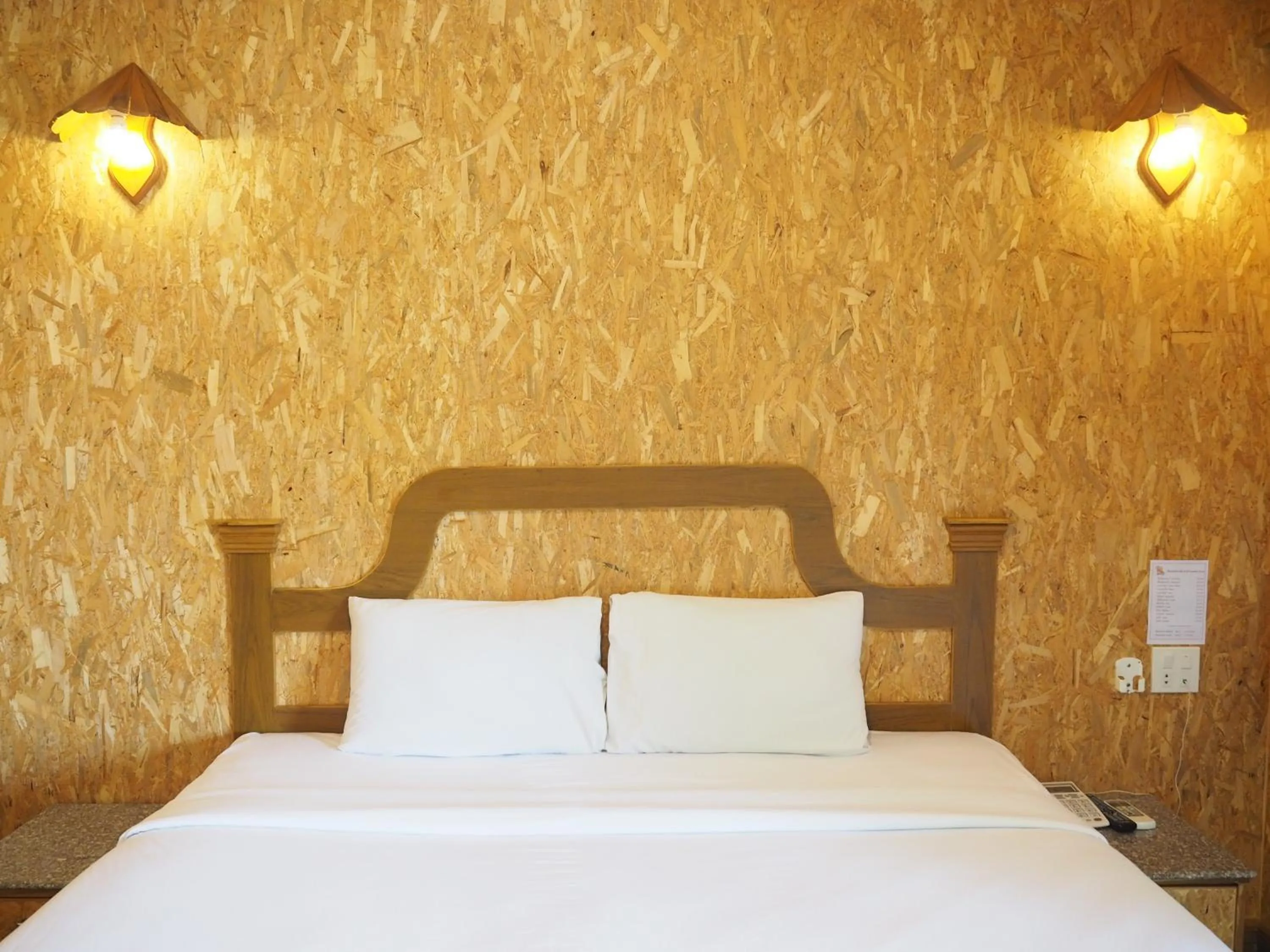 Bed in Chatsuree Boutique Resort