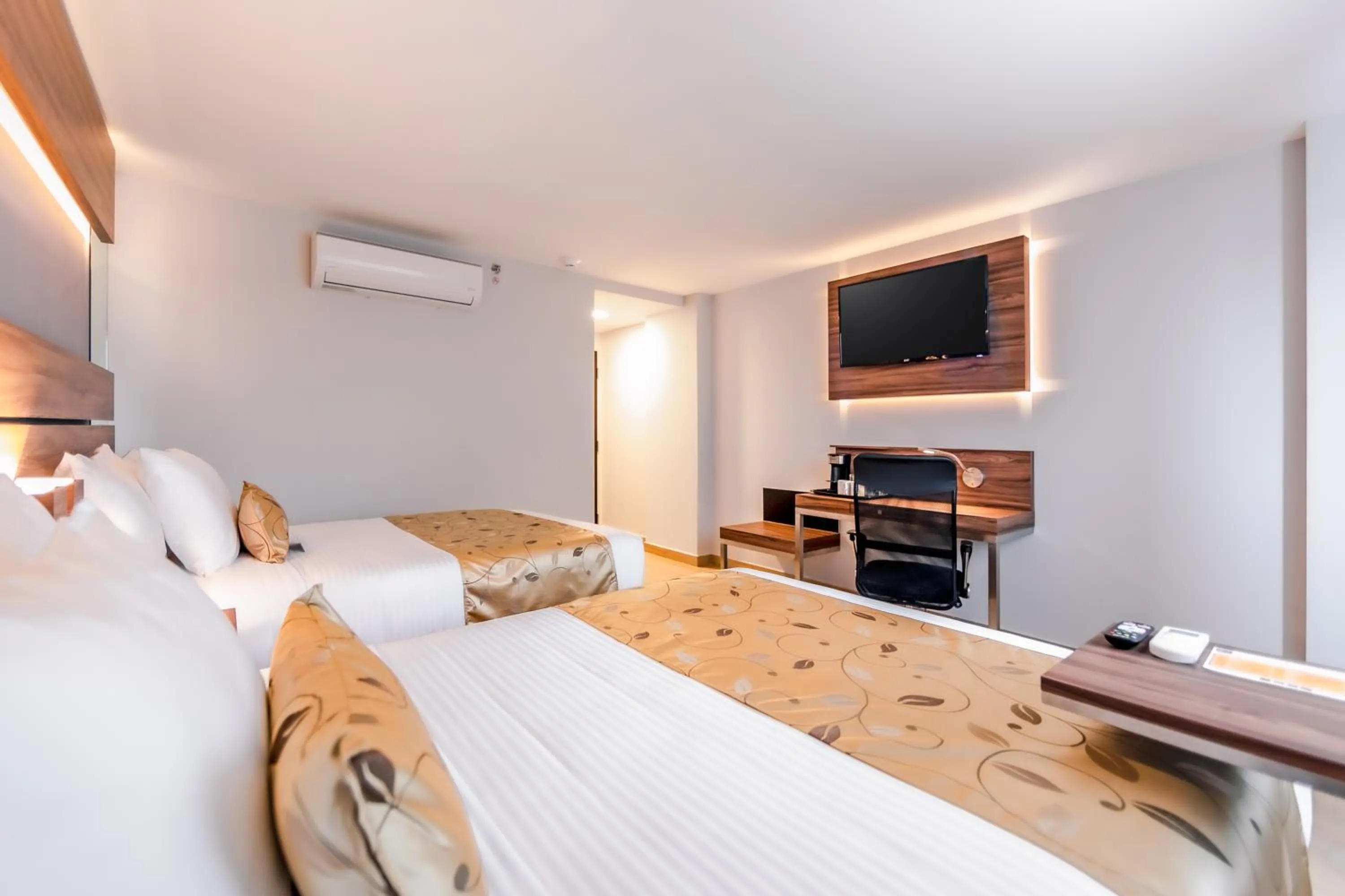 Bed in Sleep Inn Tijuana