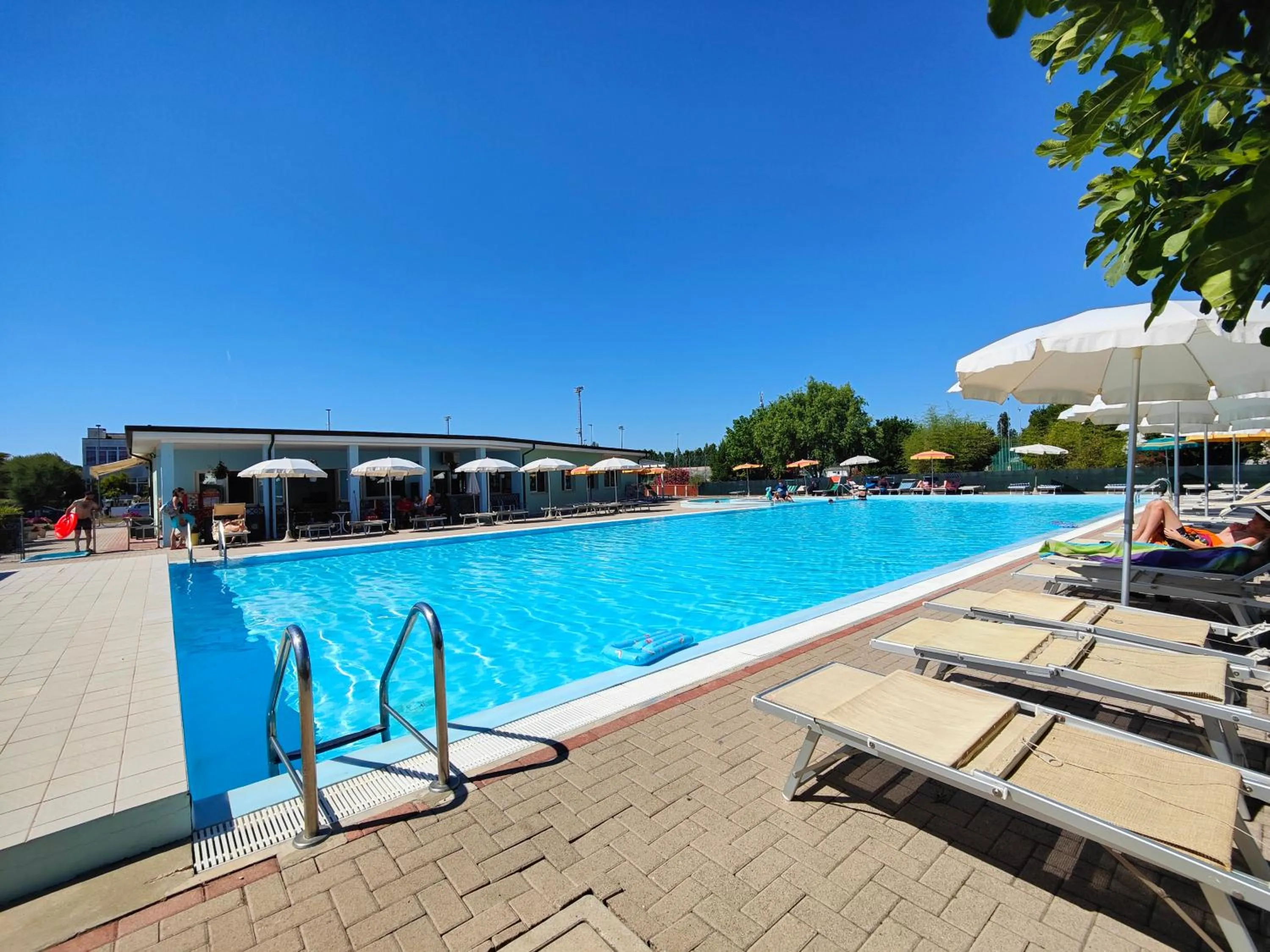 Swimming pool in Long Beach Village Residence on the sea with private beach included