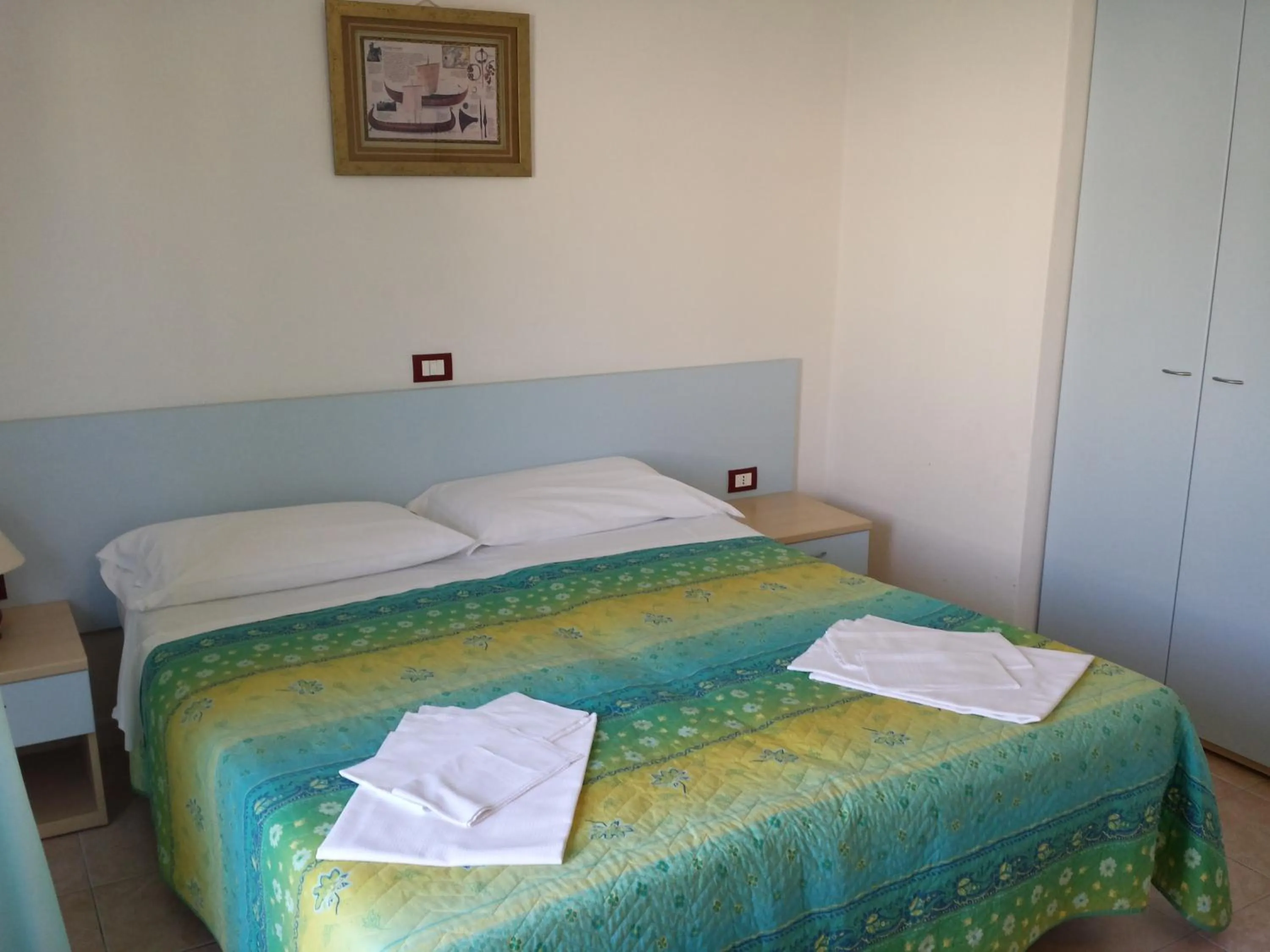 Bed in Long Beach Village Residence on the sea with private beach included