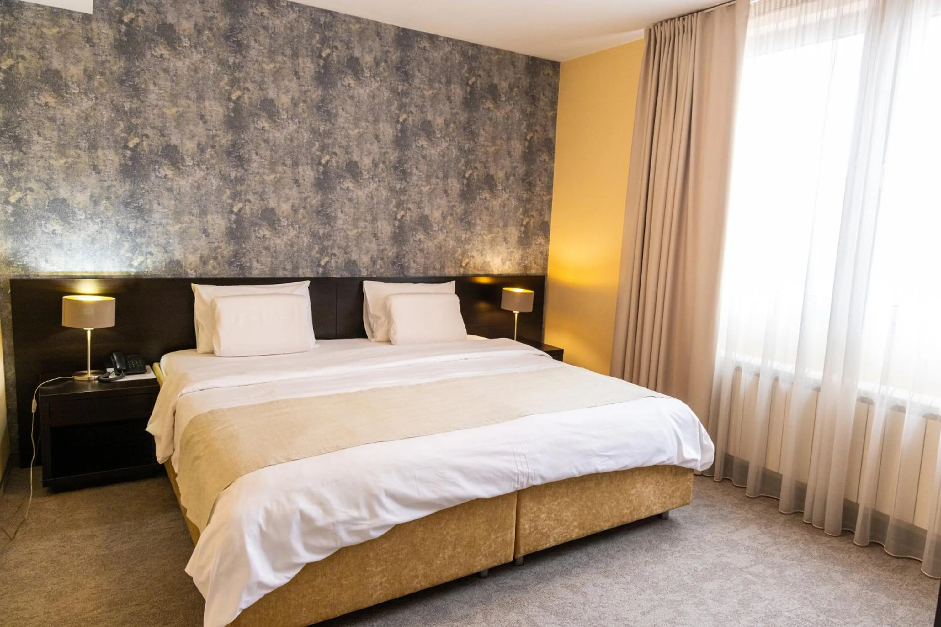 Bed in Garni Hotel Nevski