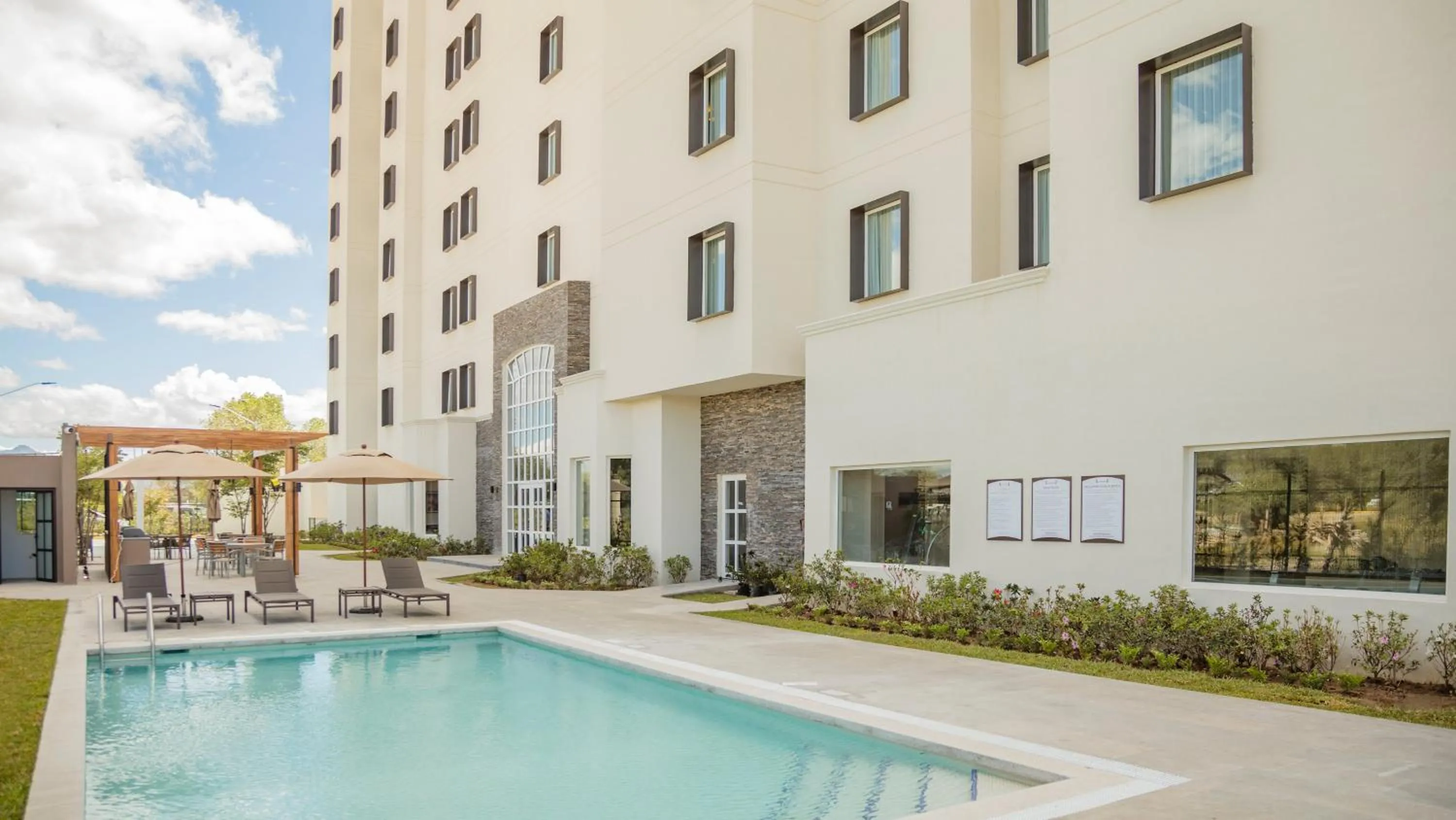 Swimming pool in Staybridge Suites - Irapuato by IHG