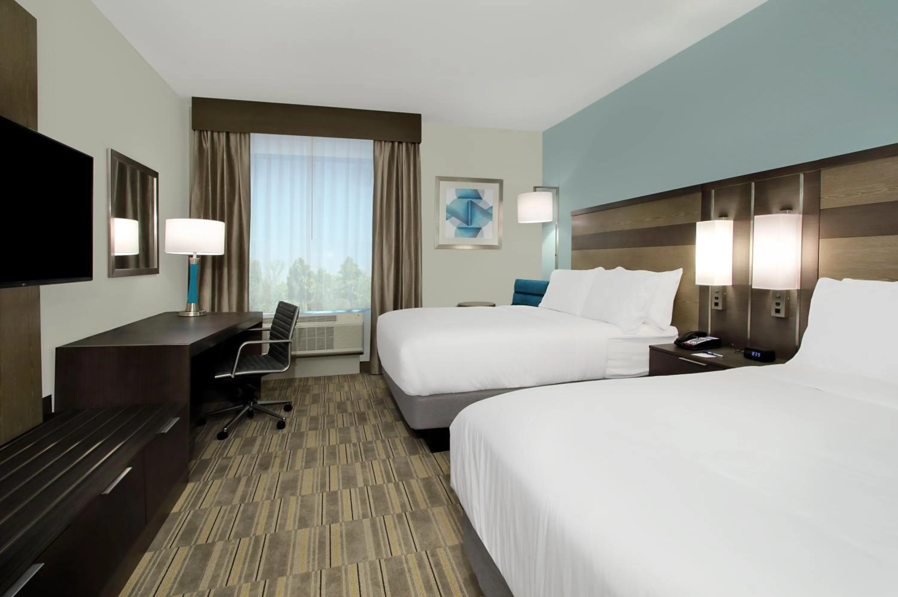 Photo of the whole room, Bed in Holiday Inn Express & Suites - Lake Charles South Casino Area by IHG