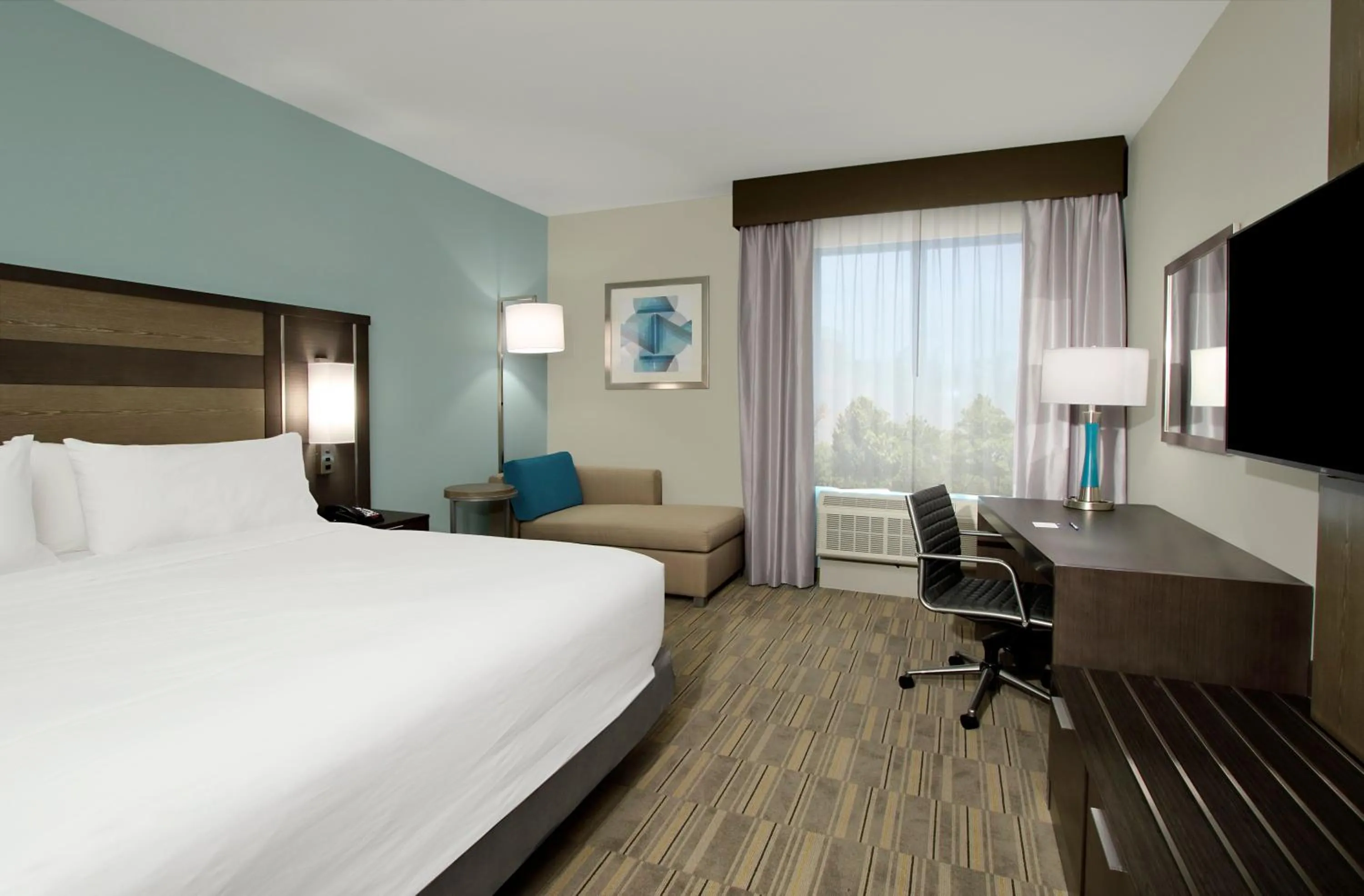 Photo of the whole room, Bed in Holiday Inn Express & Suites - Lake Charles South Casino Area by IHG
