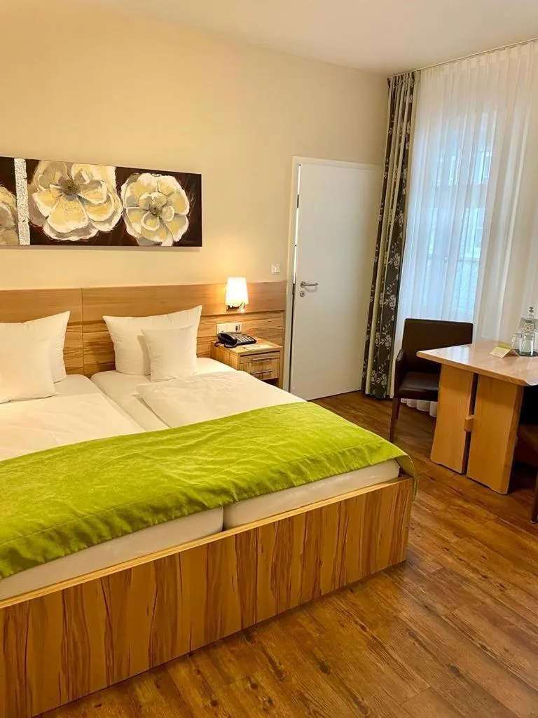 Photo of the whole room, Bed in GDA Hotel Schwiecheldthaus