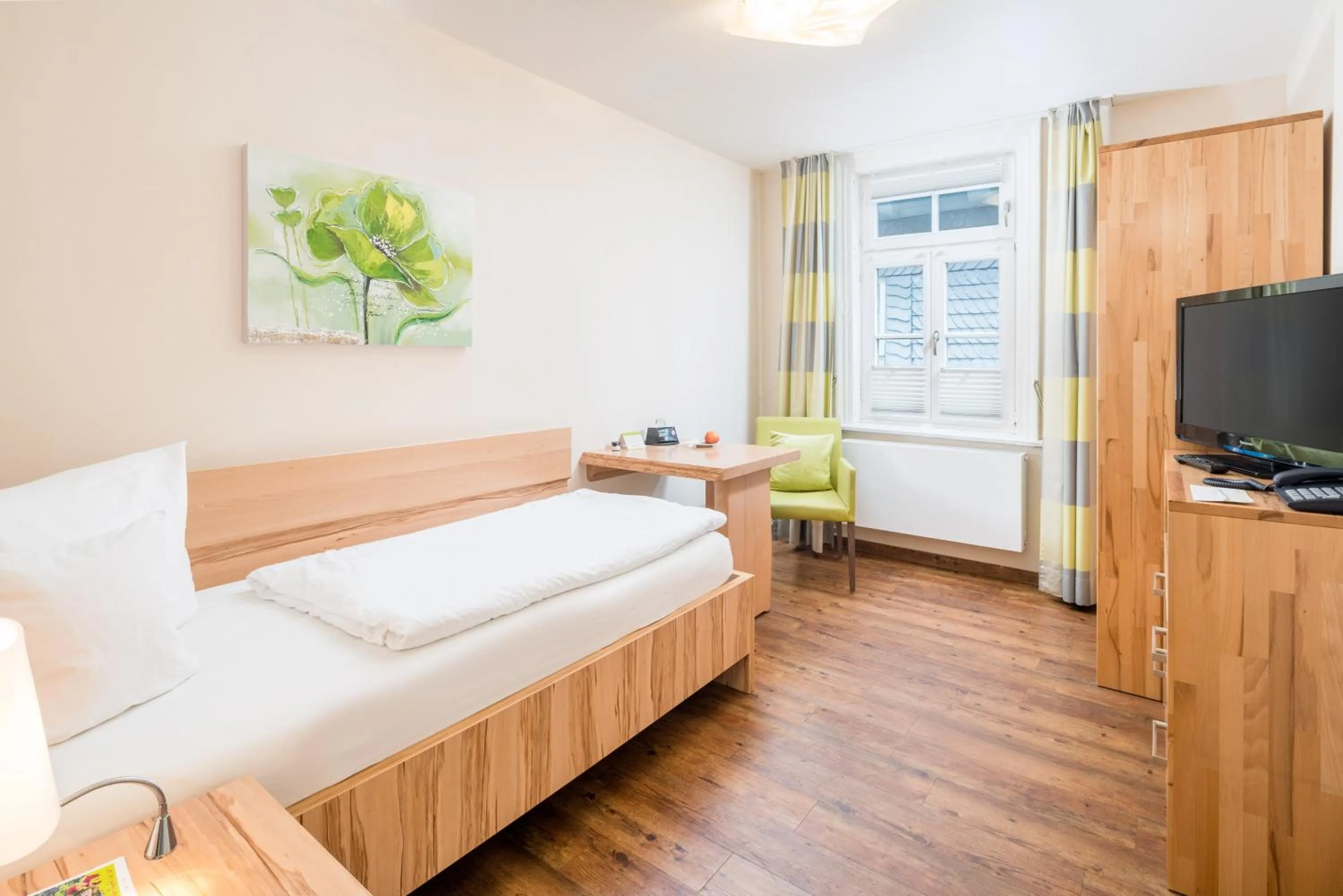 Photo of the whole room, Bed in GDA Hotel Schwiecheldthaus