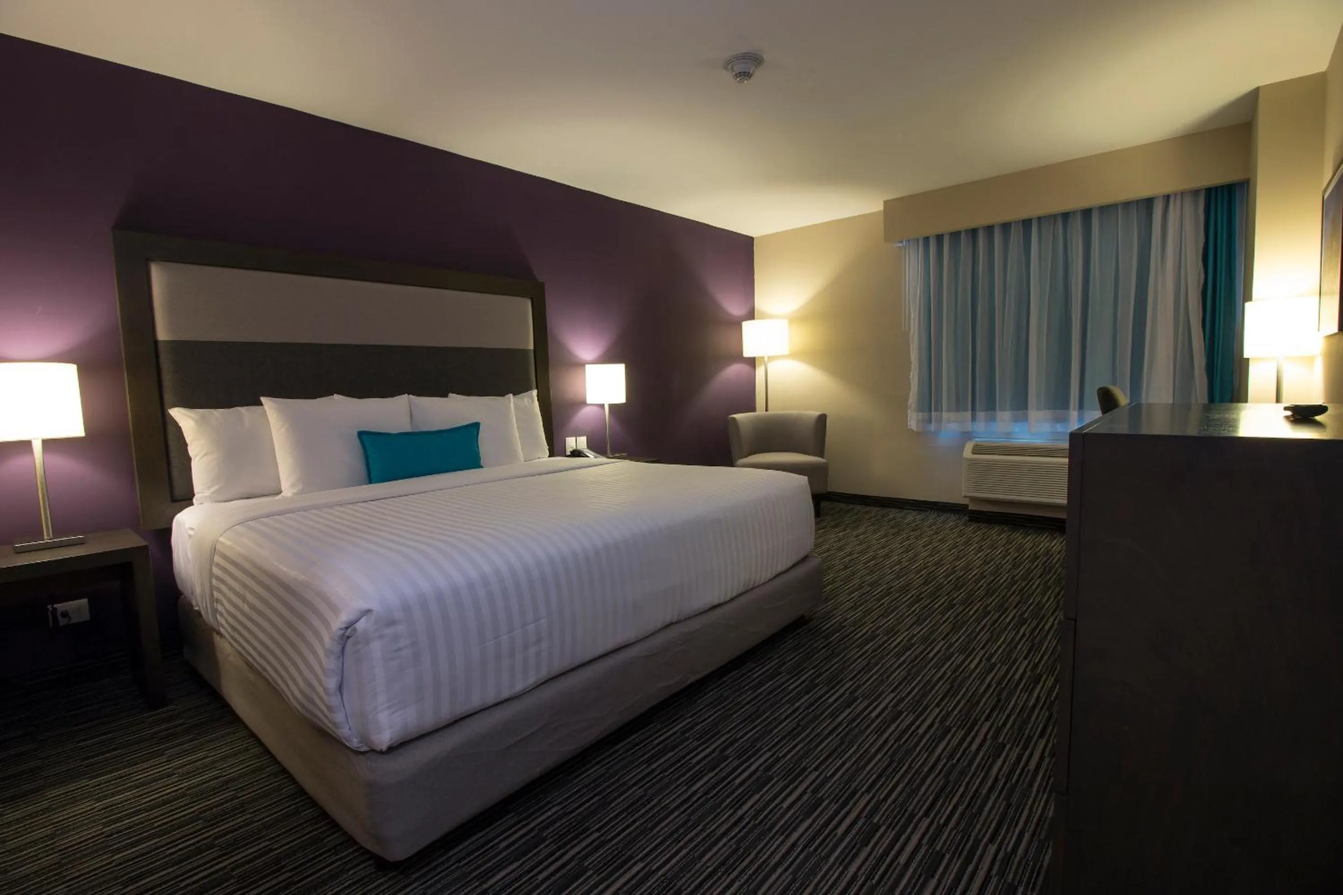 Bed in CHN Hotel Monterrey Aeropuerto, Trademark by Wyndham