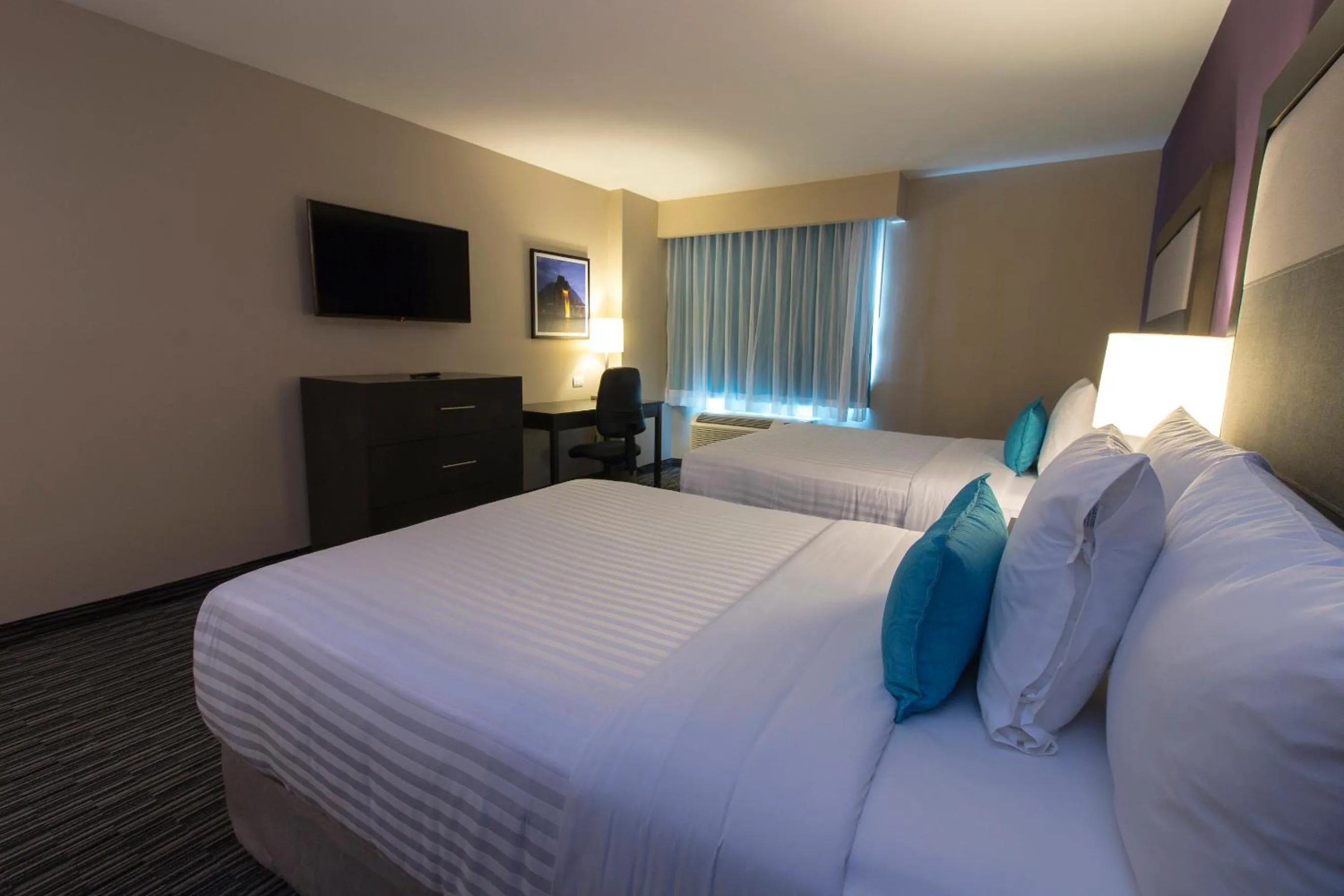 Bed in CHN Hotel Monterrey Aeropuerto, Trademark by Wyndham