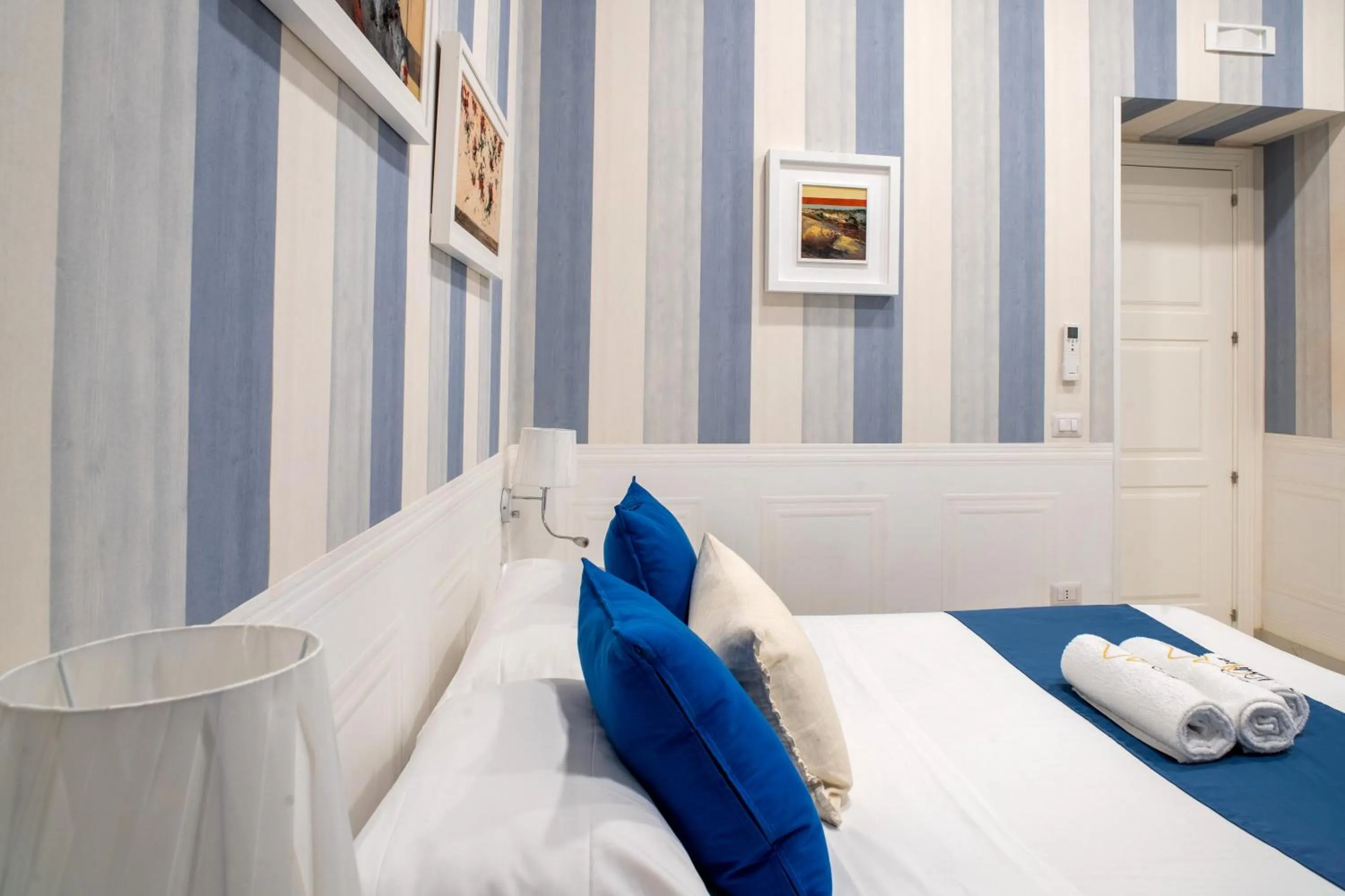 Bed in Napoliviva Bovio