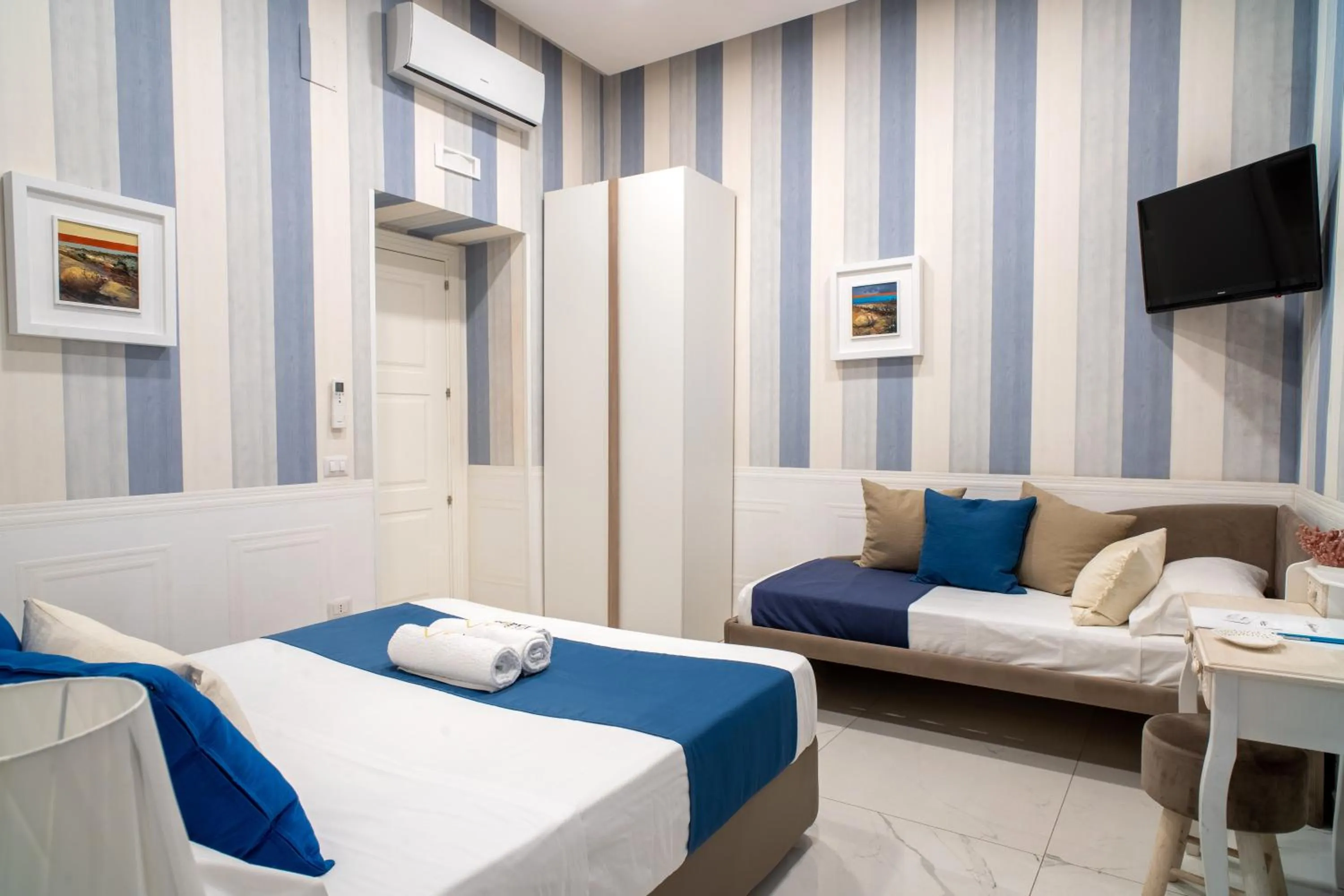 Bed in Napoliviva Bovio