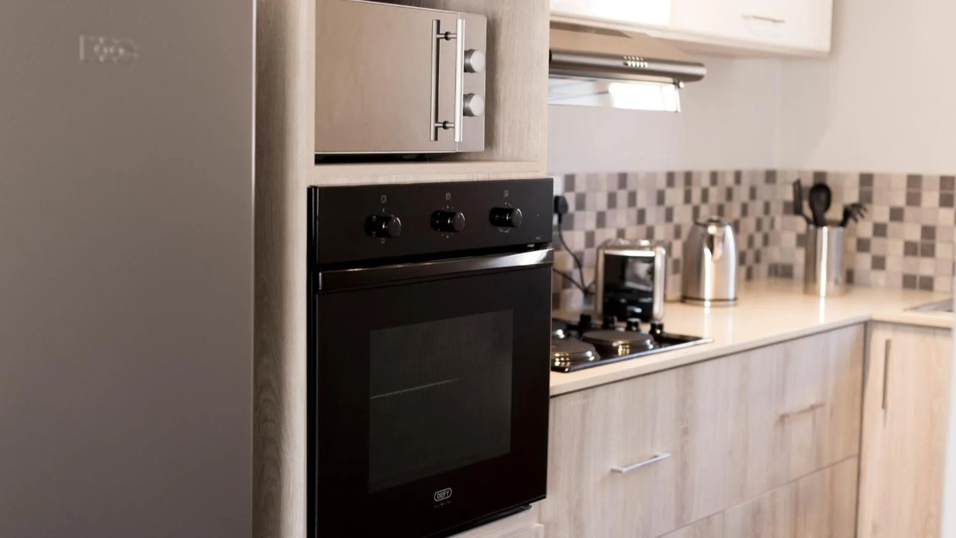 Kitchen or kitchenette in 3 Lux Suites