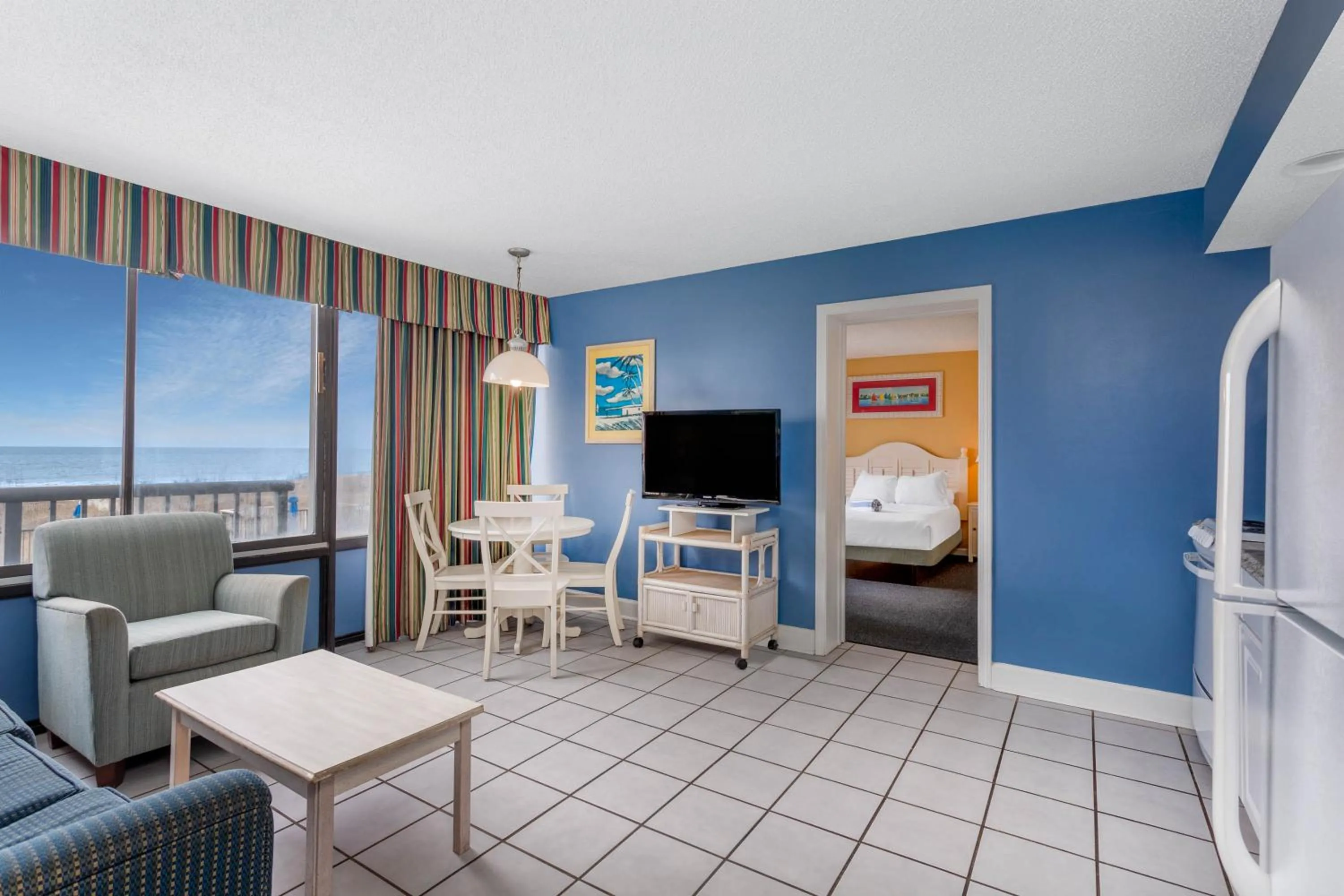 Living room in Ocean Club Resort Myrtle Beach a Ramada by Wyndham