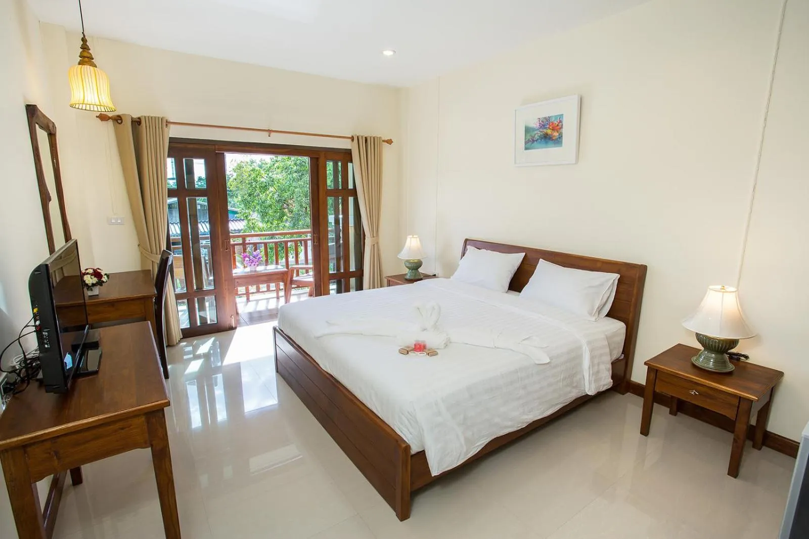 Bed in Oh Amphawa Boutique Resort