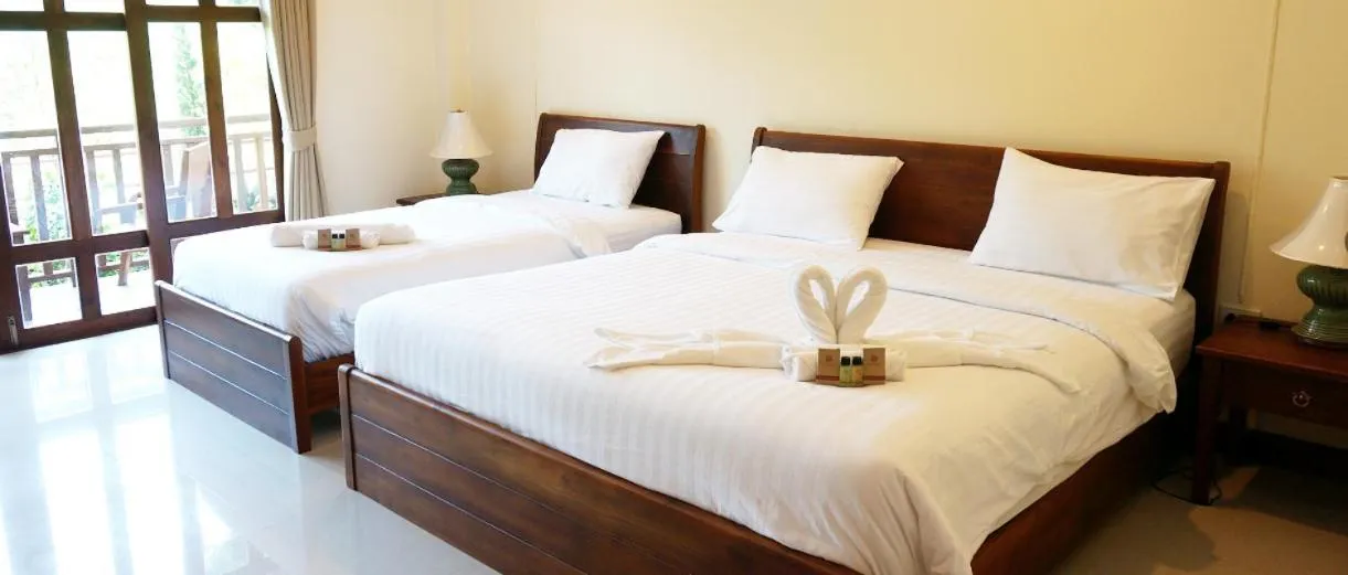 Bed in Oh Amphawa Boutique Resort