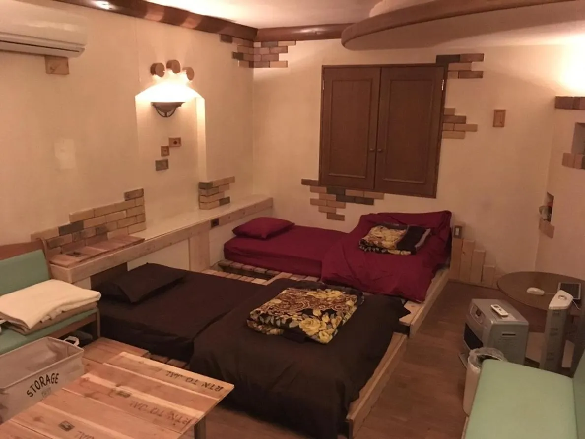 Bed in ILA Hakushu Guesthouse