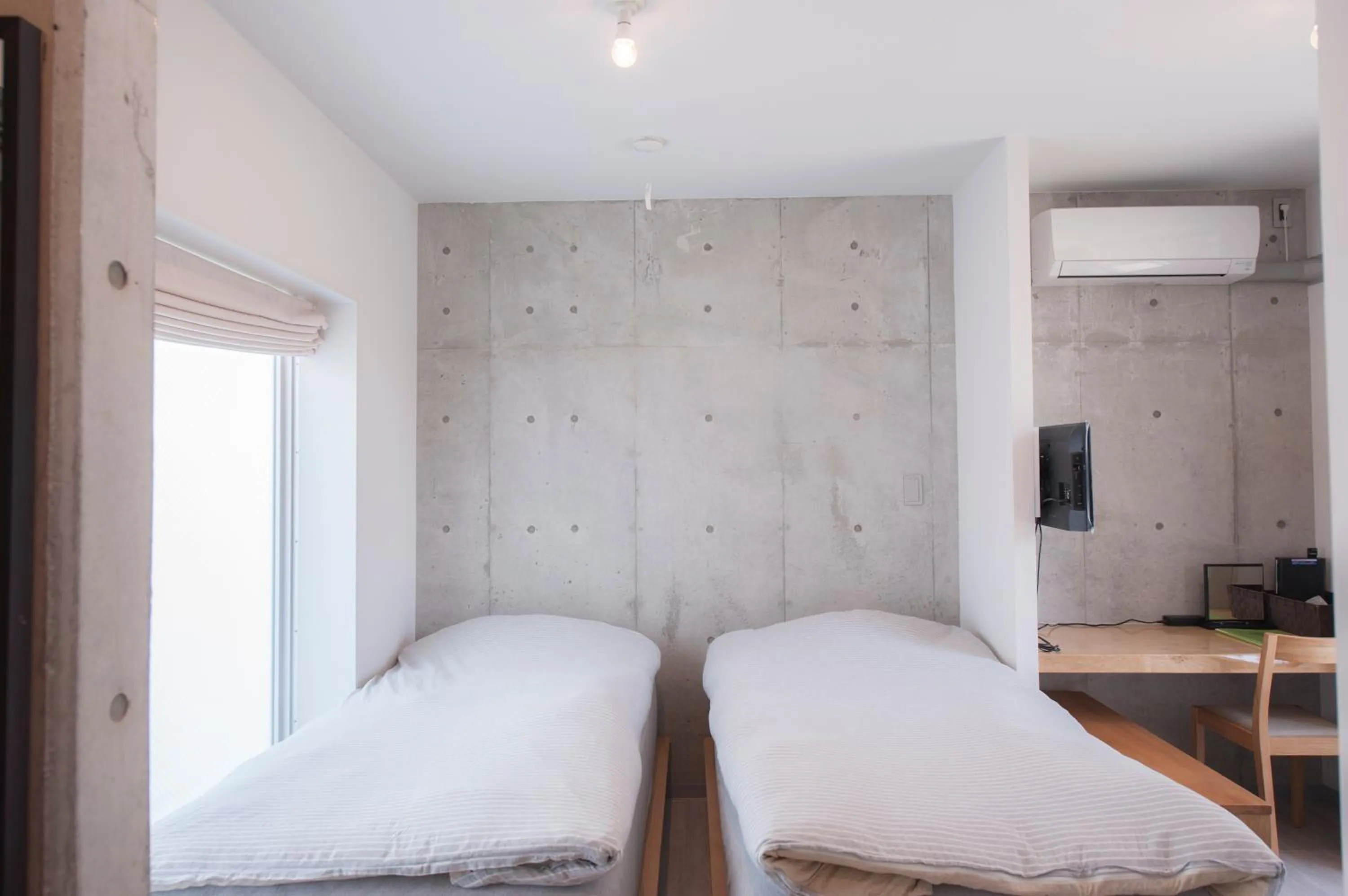 Photo of the whole room, Bed in bmj Shinjuku Okubo