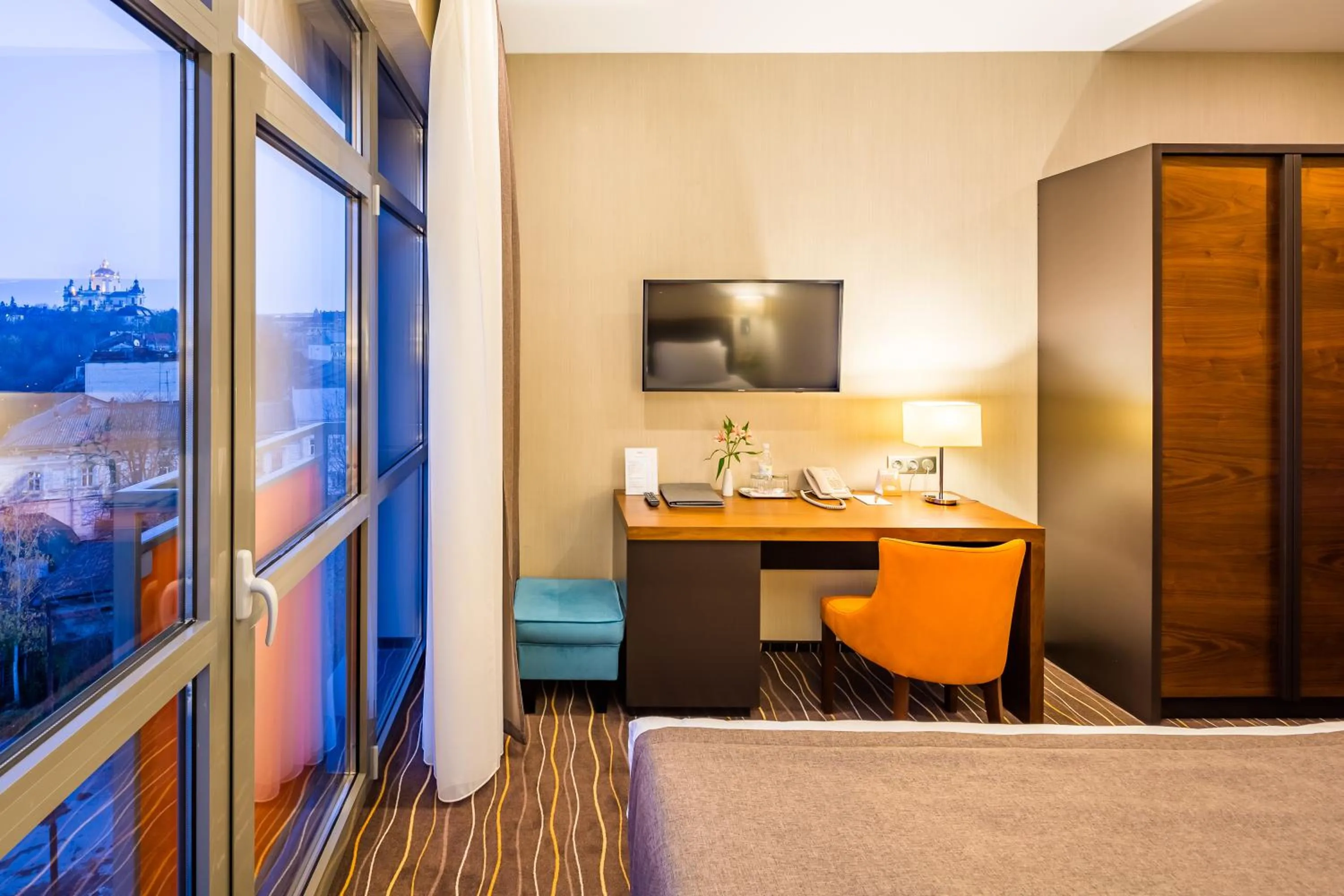 Bed in Taurus City Hotel