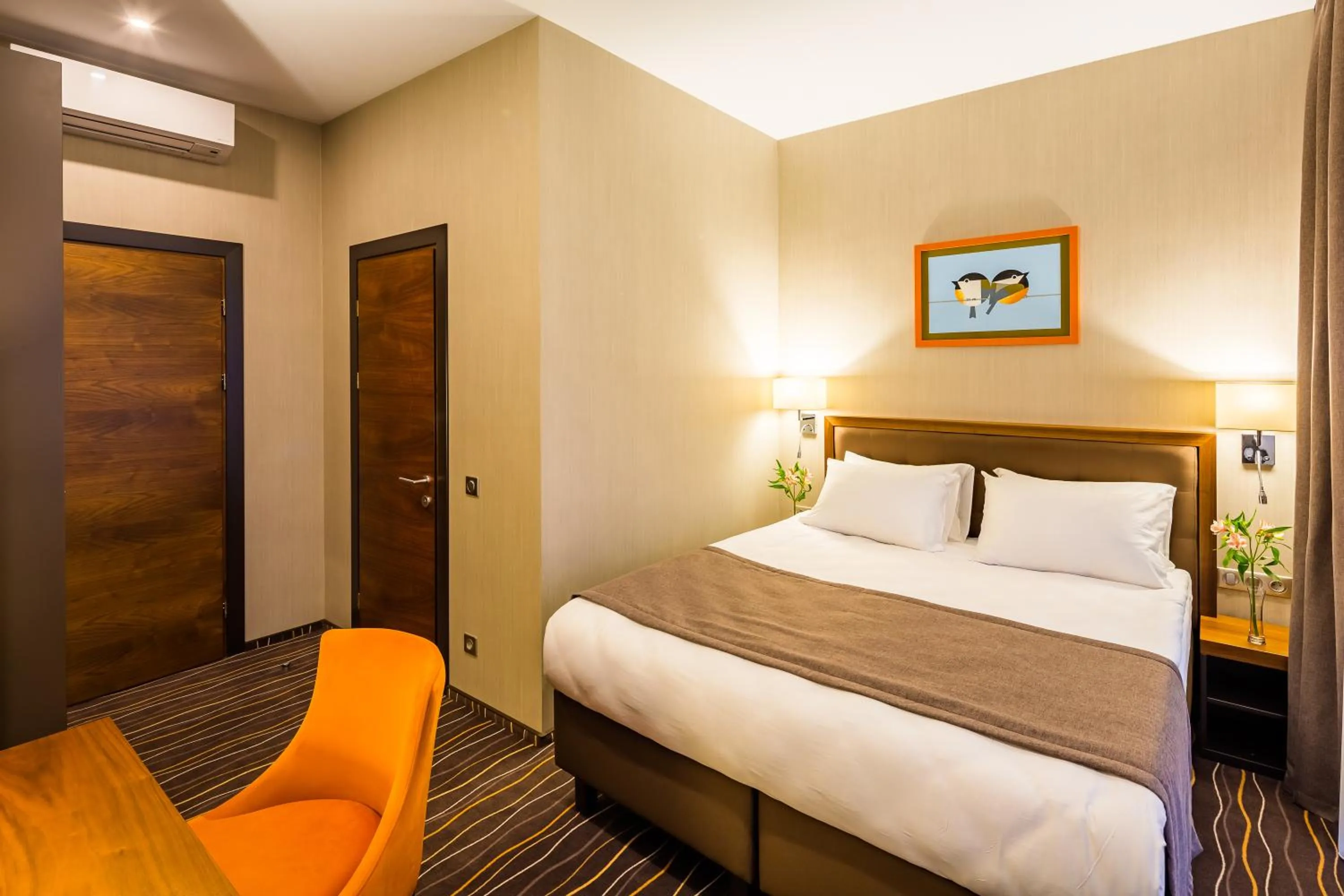 Bed in Taurus City Hotel