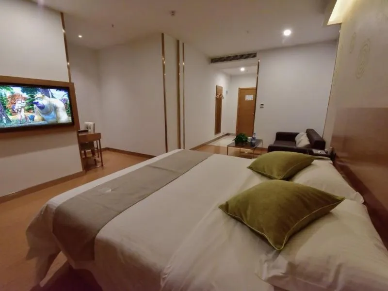 Bed in GreenTree Inn Huanggang Qichun County Ouyada Square Express Hotel