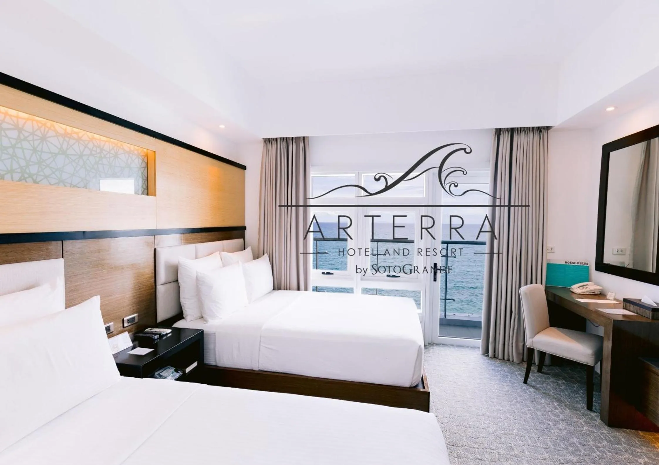 Bed in Arterra Hotel and Resort