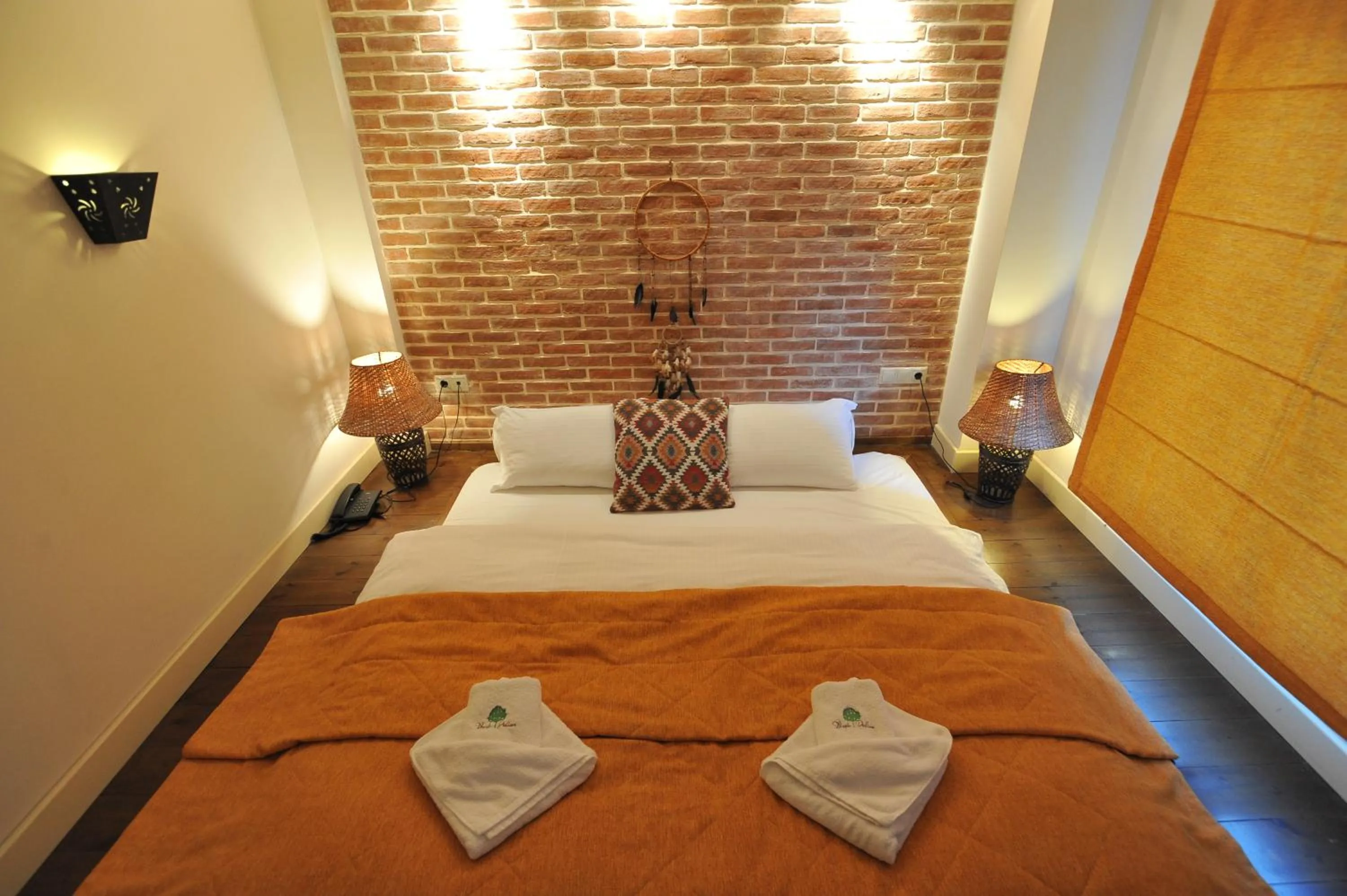 Toilet, Bed in Vaela Hotel Cultural Resort