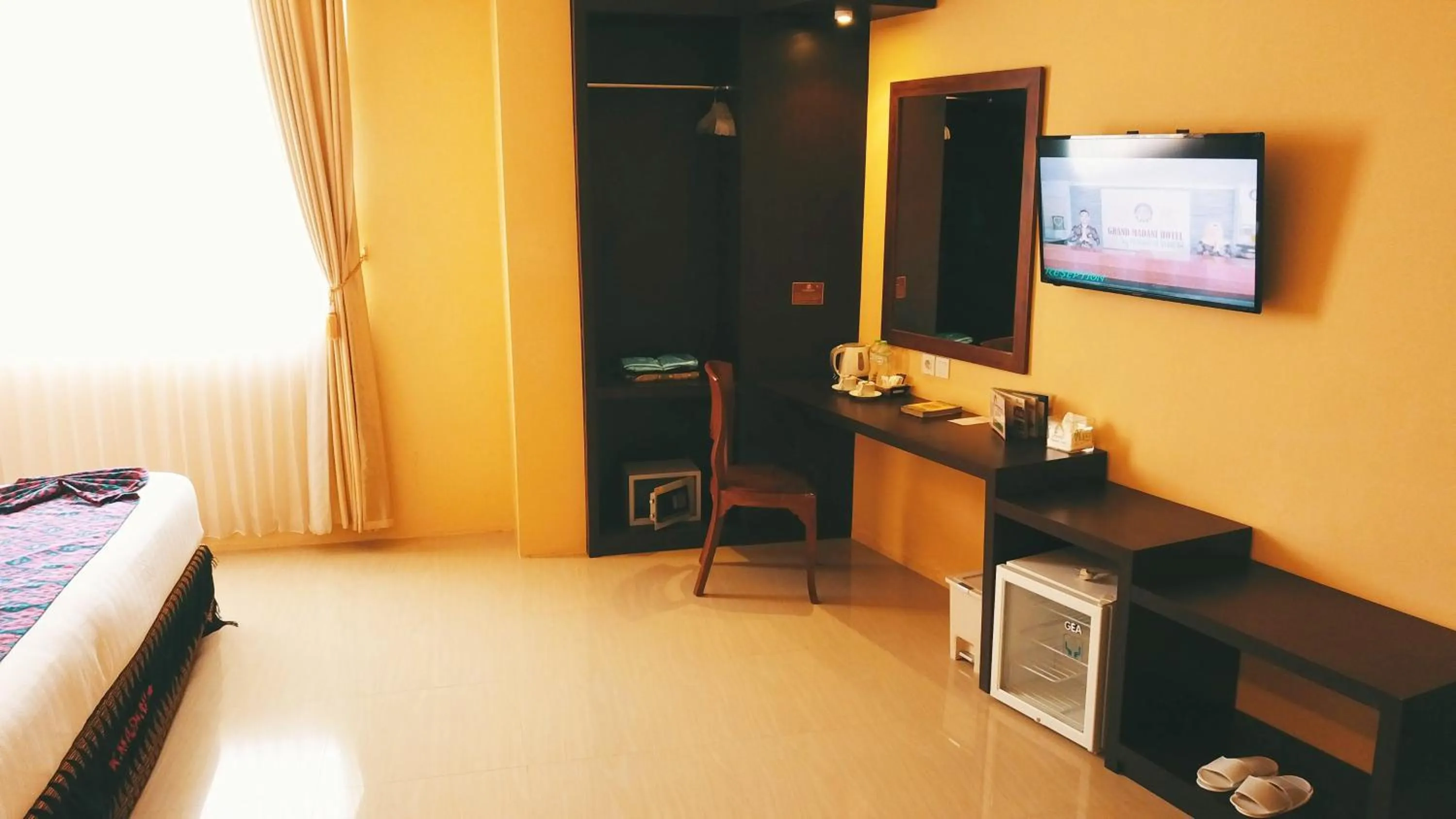 Coffee/tea facilities, Bed in Grand Madani Hotel