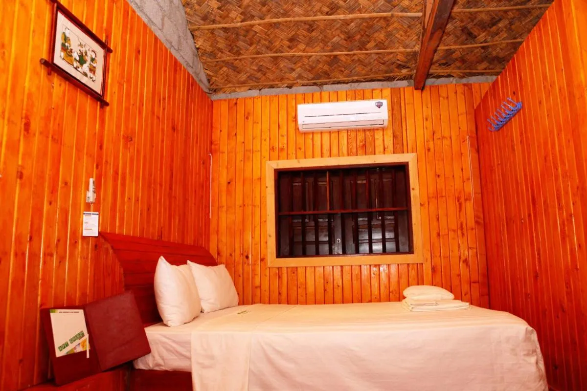 Bed in Whisper Nature Bungalow & Resort