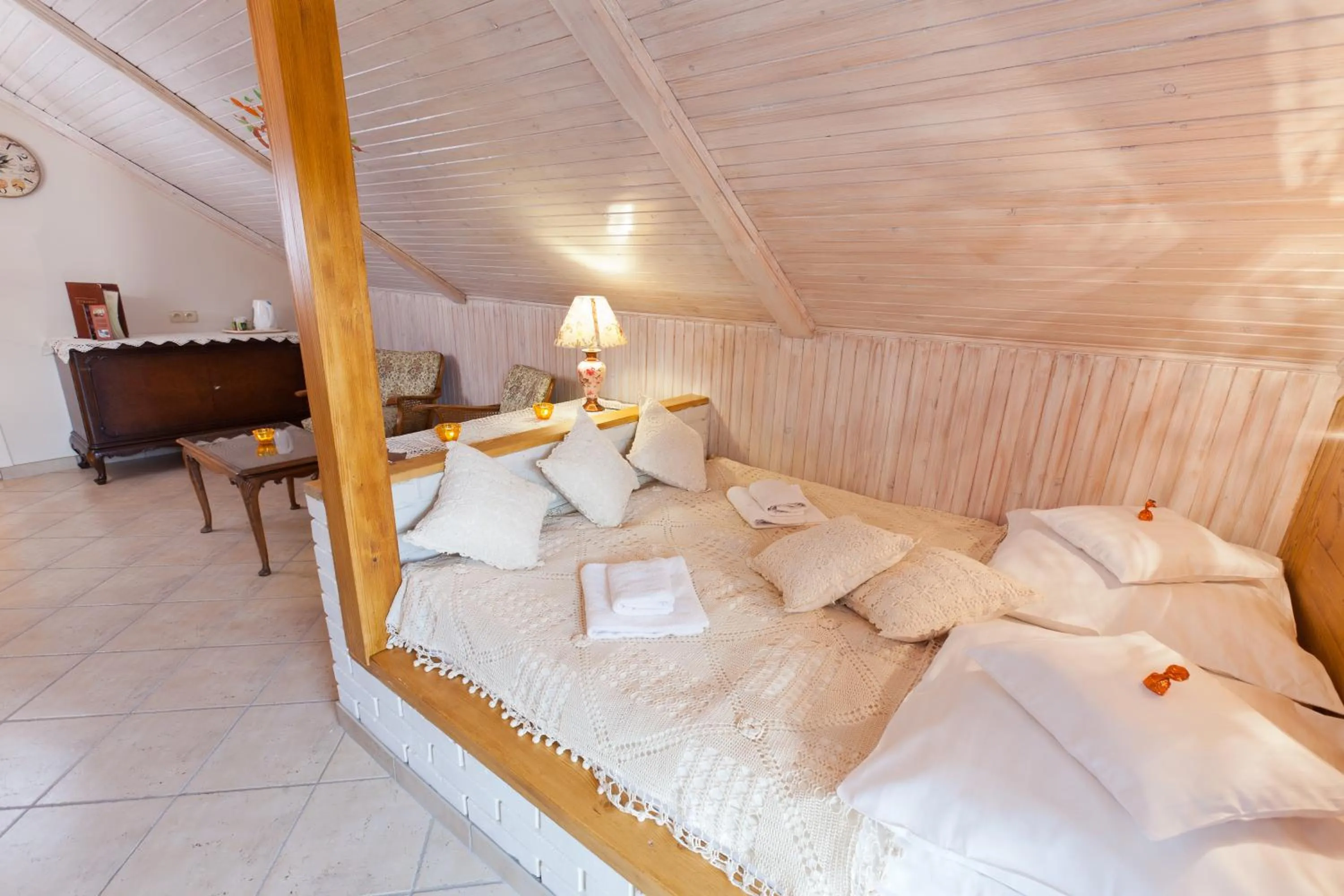 Bed in Villa Cynamon Jacuzzi & Sauna