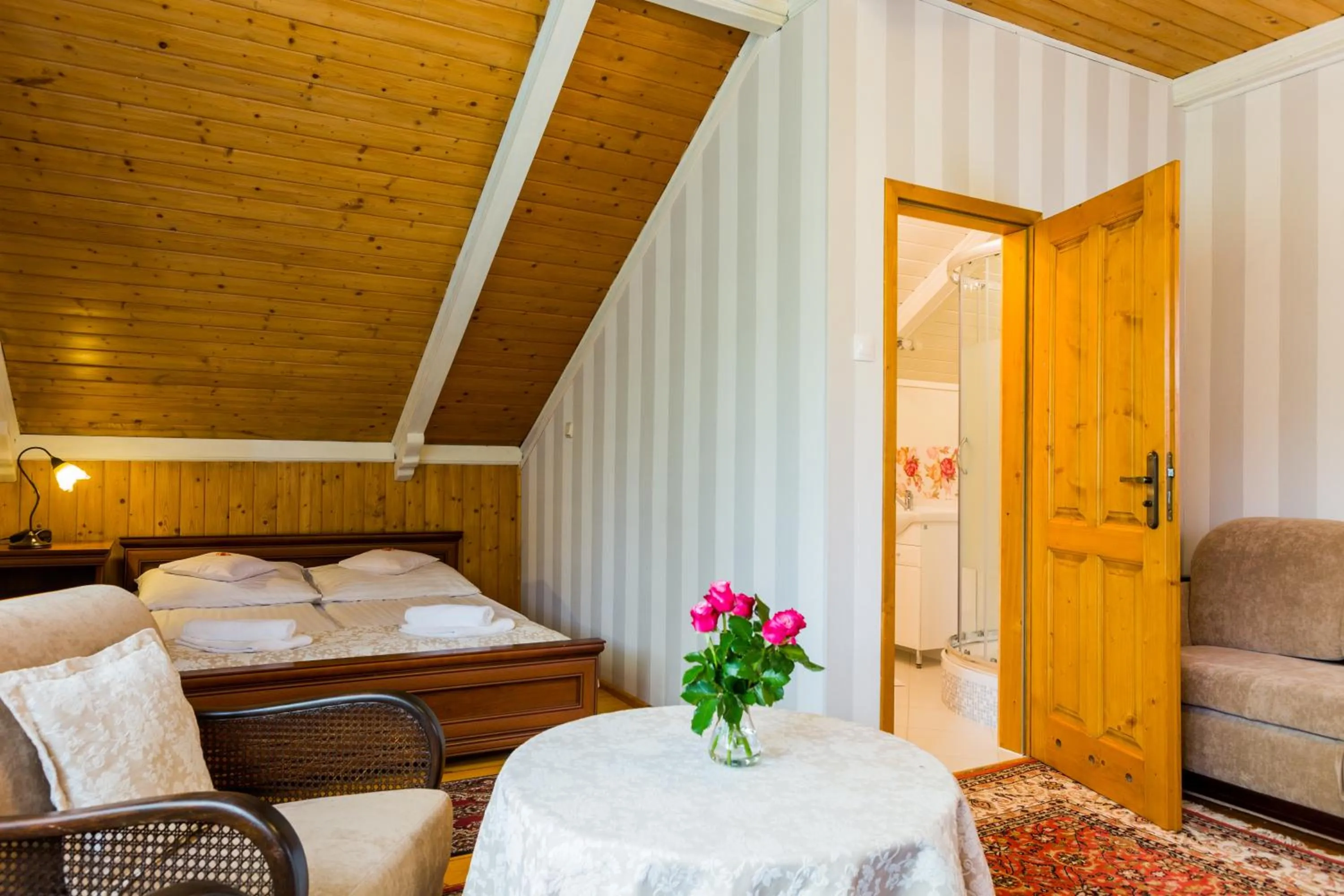 Bed in Villa Cynamon Jacuzzi & Sauna