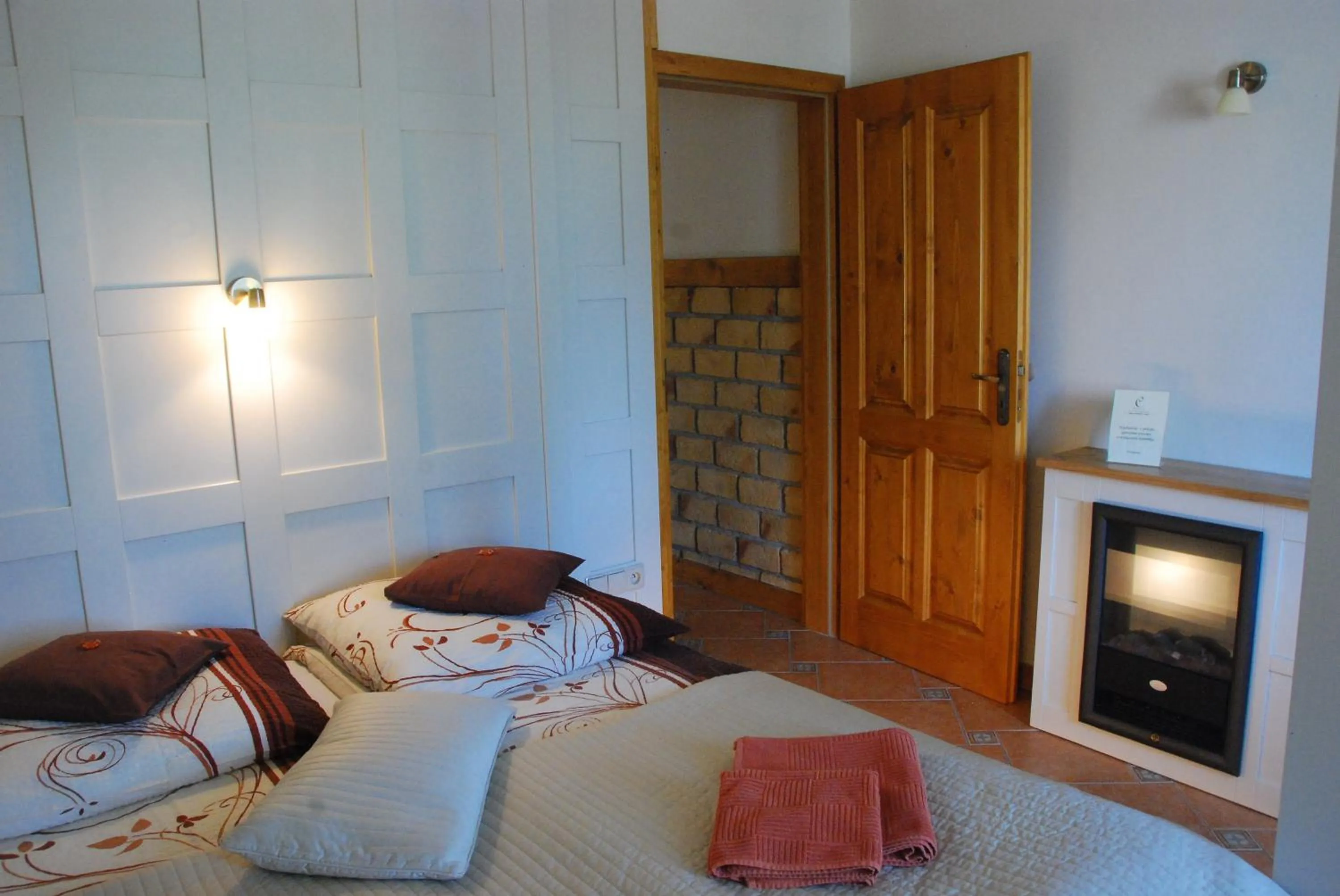 Bed in Villa Cynamon Jacuzzi & Sauna